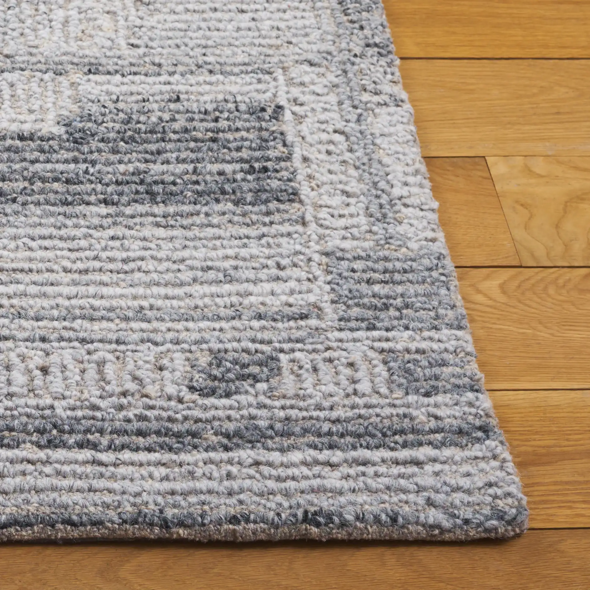 Harvest Stacked Blocks Hand-Tufted Wool Rug in Gray in a styled room