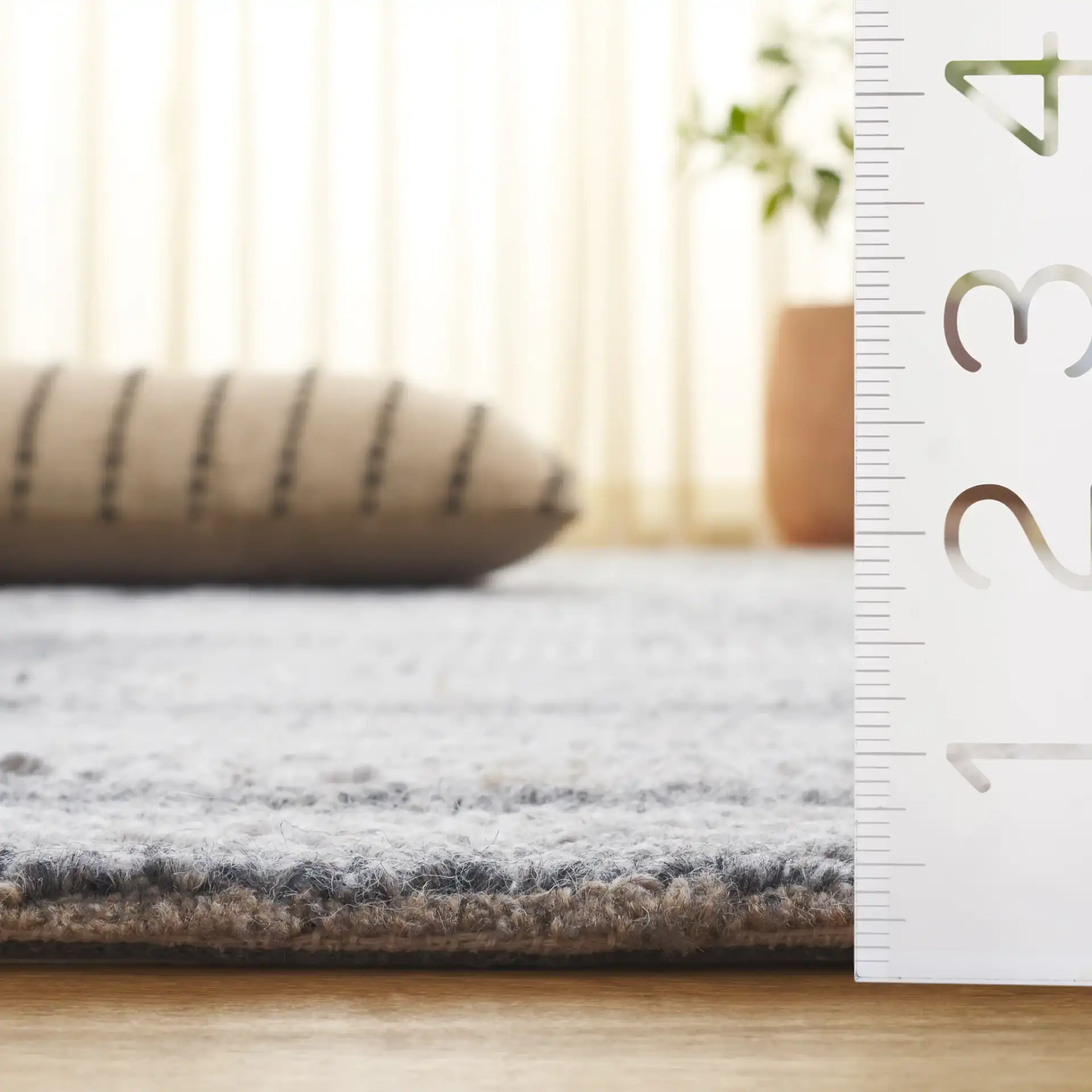 Harvest Stacked Blocks Hand-Tufted Wool Rug in Gray in a styled room
