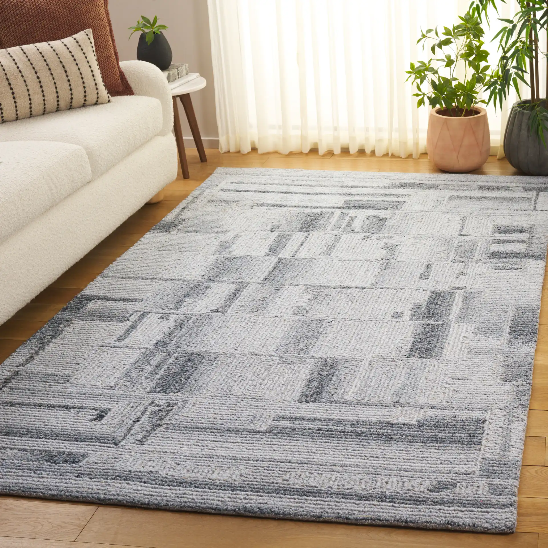 Harvest Stacked Blocks Hand-Tufted Wool Rug in Gray in a styled room