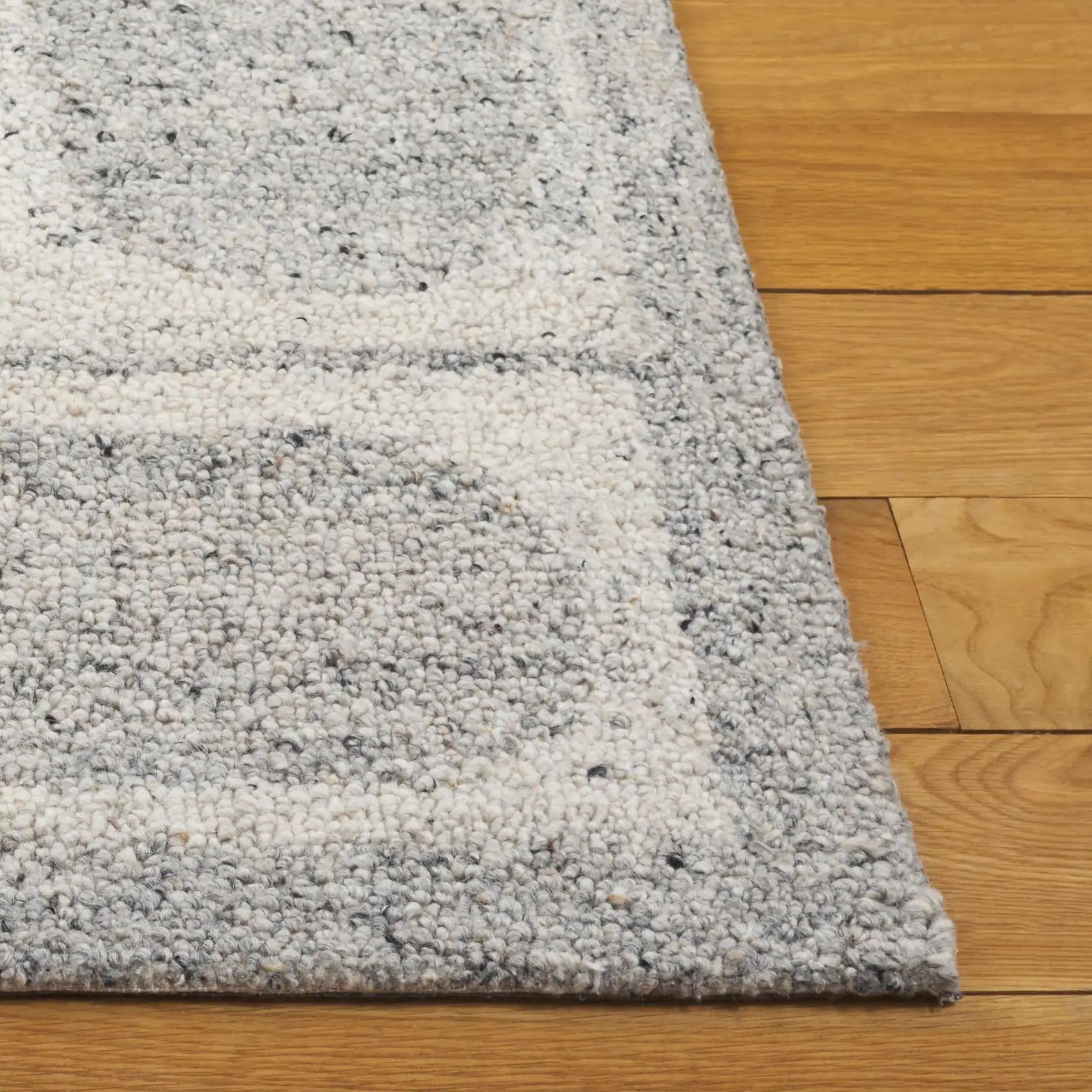 Harvest Arch And Block Hand-Tufted Wool Rug in Silver / Gray in a styled room