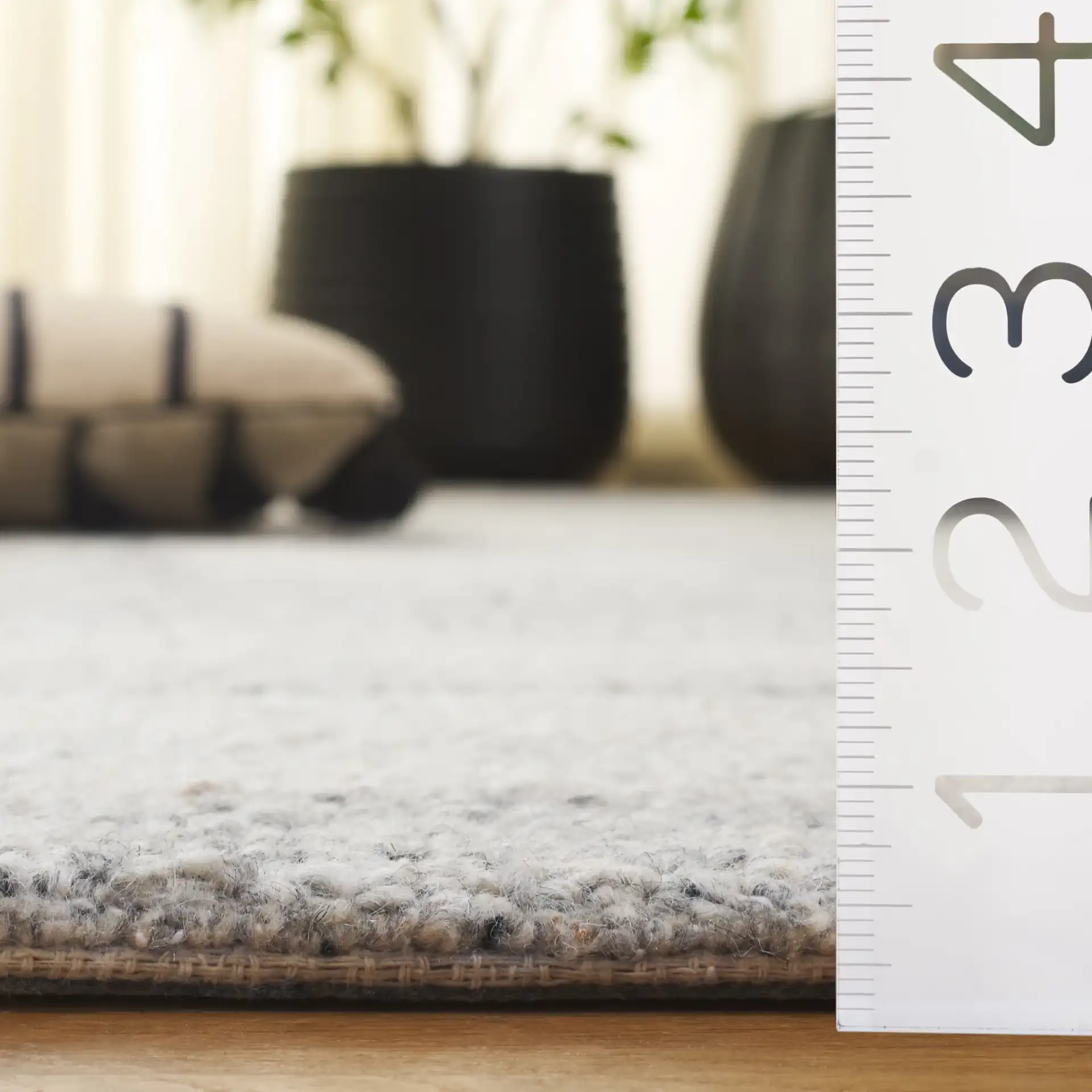 Harvest Arch And Block Hand-Tufted Wool Rug in Silver / Gray in a styled room