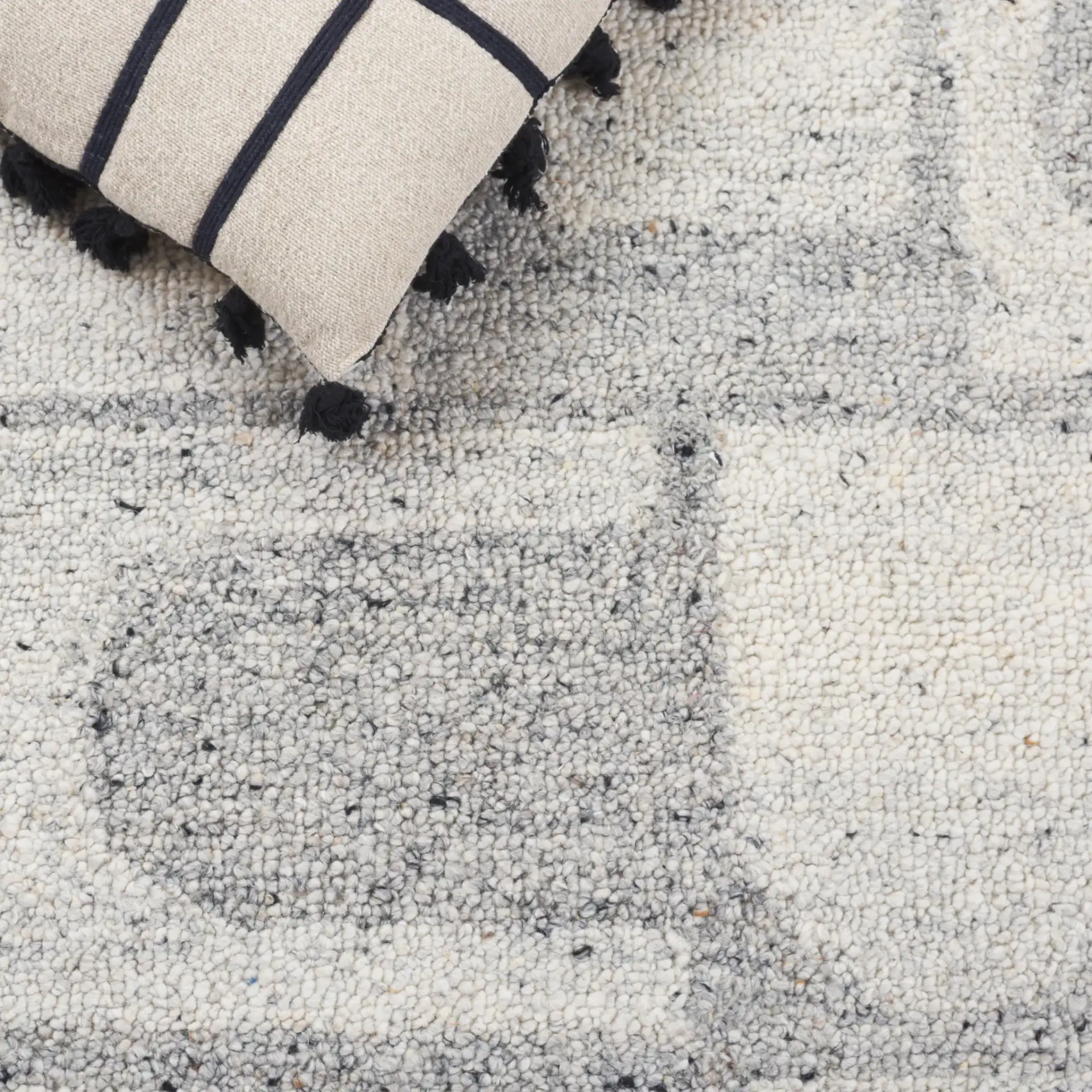 Harvest Arch And Block Hand-Tufted Wool Rug in Silver / Gray in a styled room