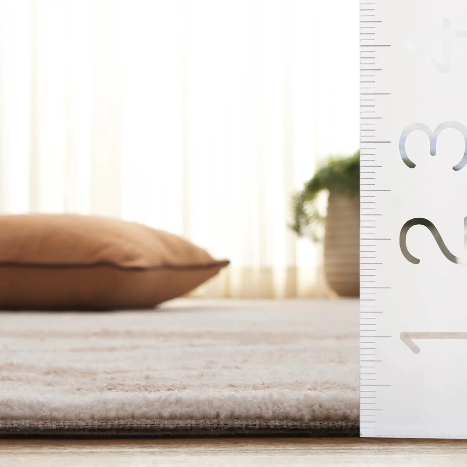Harvest Abstract Swirl Hand-Tufted Wool Rug in Ivory / Beige in a styled room