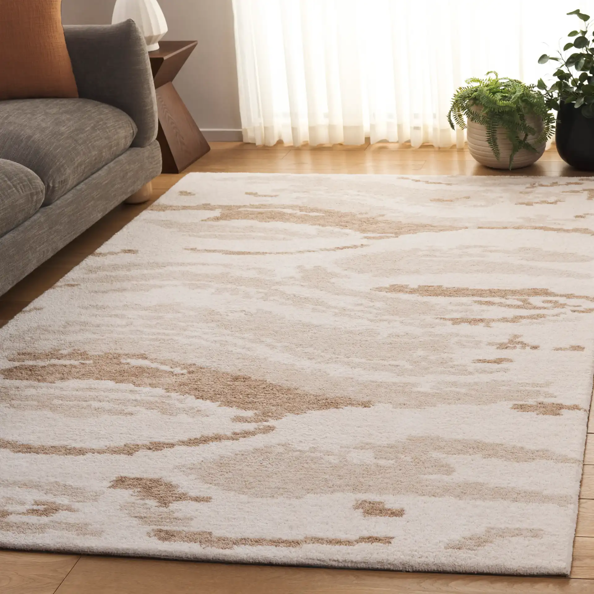Harvest Abstract Swirl Hand-Tufted Wool Rug in Ivory / Beige in a styled room