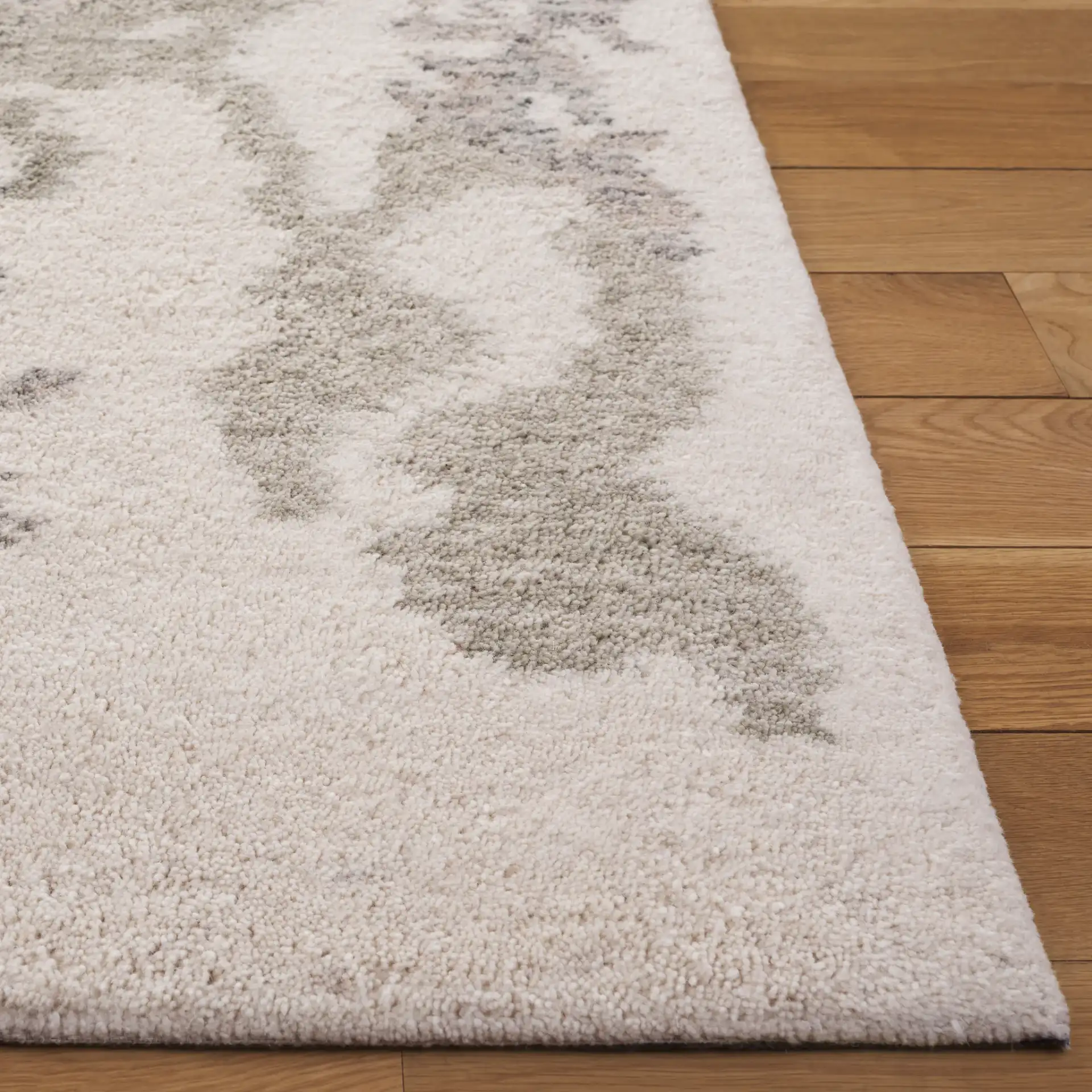 Harvest Abstract Watercolor Hand-Tufted Wool Rug in Ivory / Green in a styled room