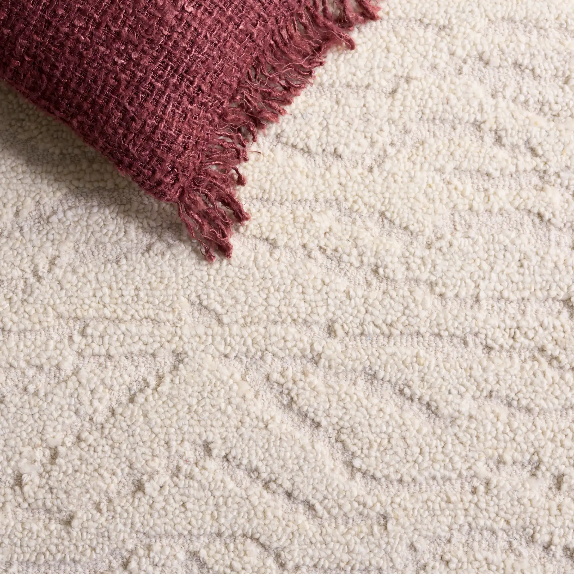 Harvest Wave Hand-Tufted Wool Rug in Ivory in a styled room