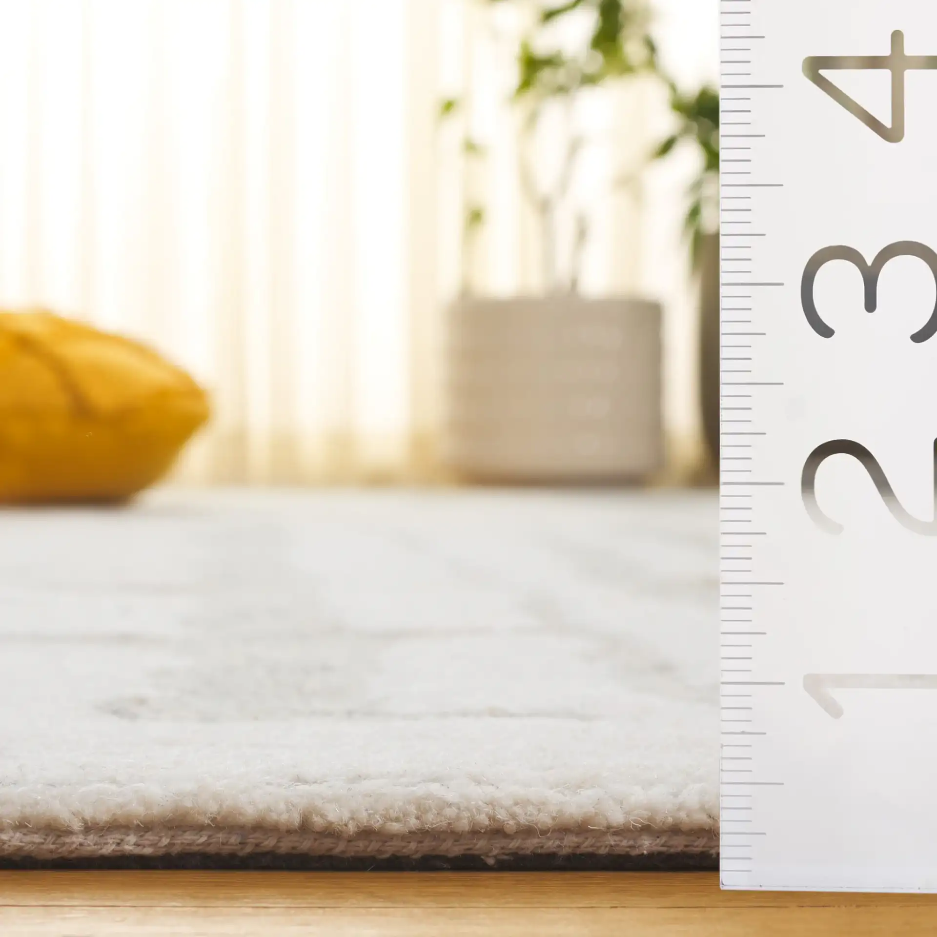 Harvest Abstract Linear Hand-Tufted Wool Rug in Ivory / Light Blue in a styled room