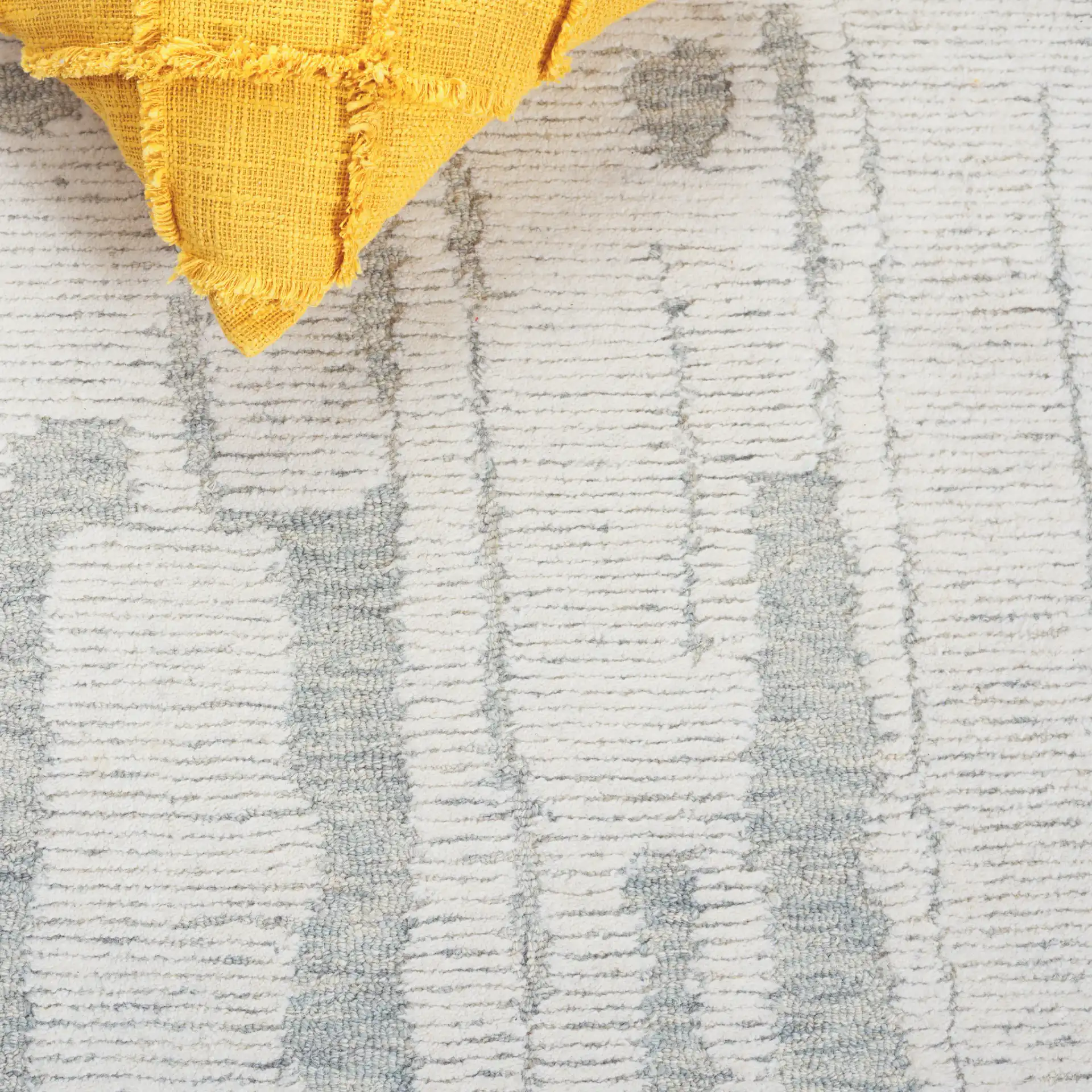 Harvest Abstract Linear Hand-Tufted Wool Rug in Ivory / Light Blue in a styled room