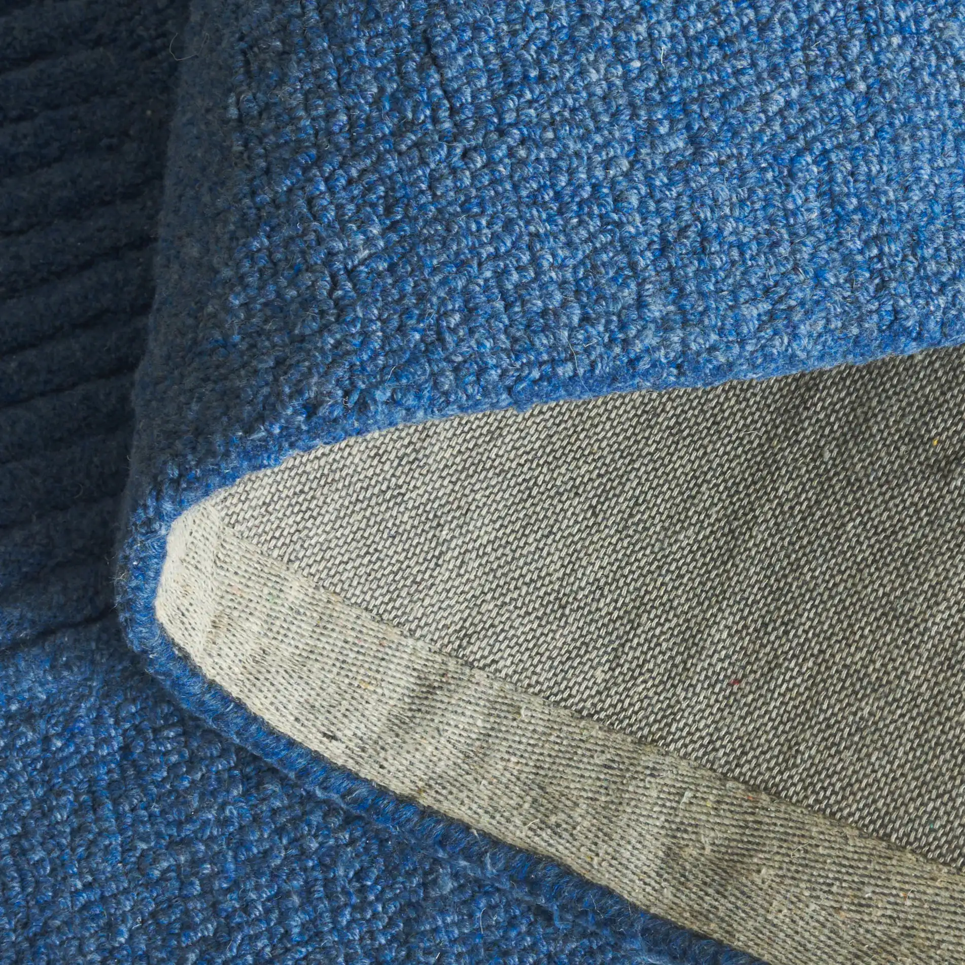 Harvest Abstract Block Hand-Tufted Rug in Blue in a styled room