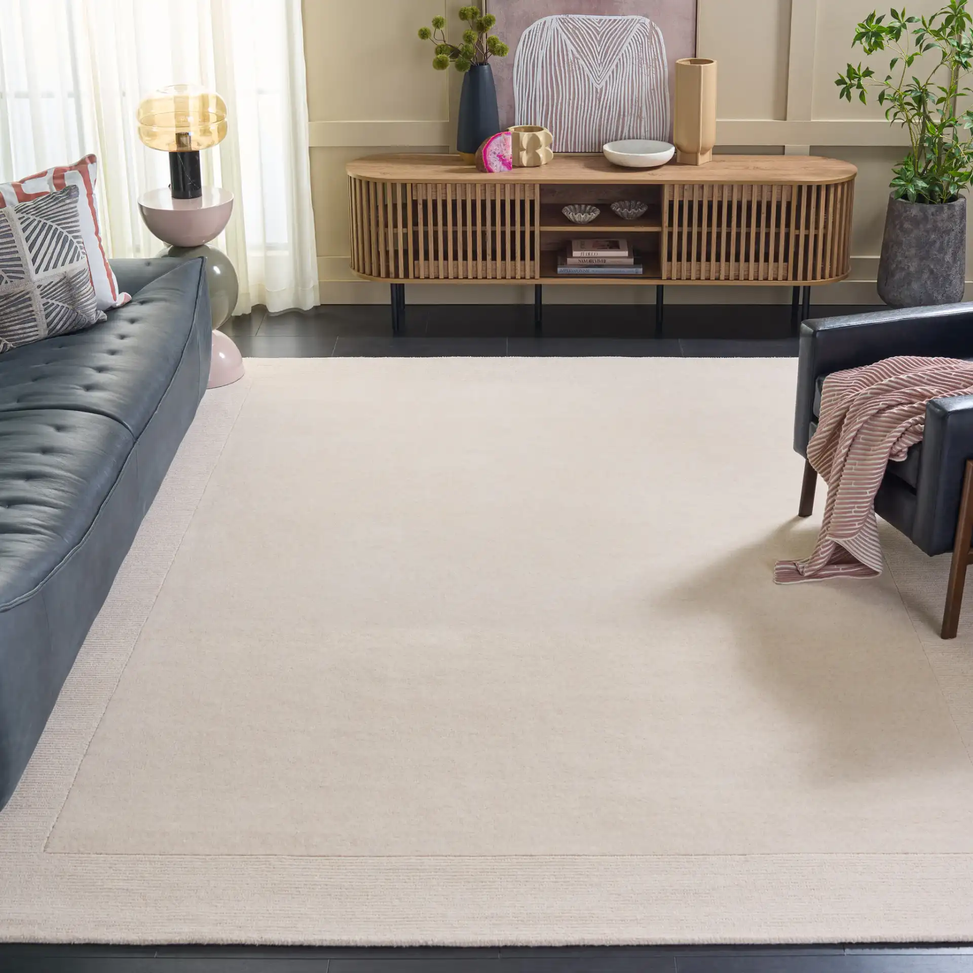 Harvest Ribbed Border Hand-Tufted Wool Rug in Ivory in a styled room