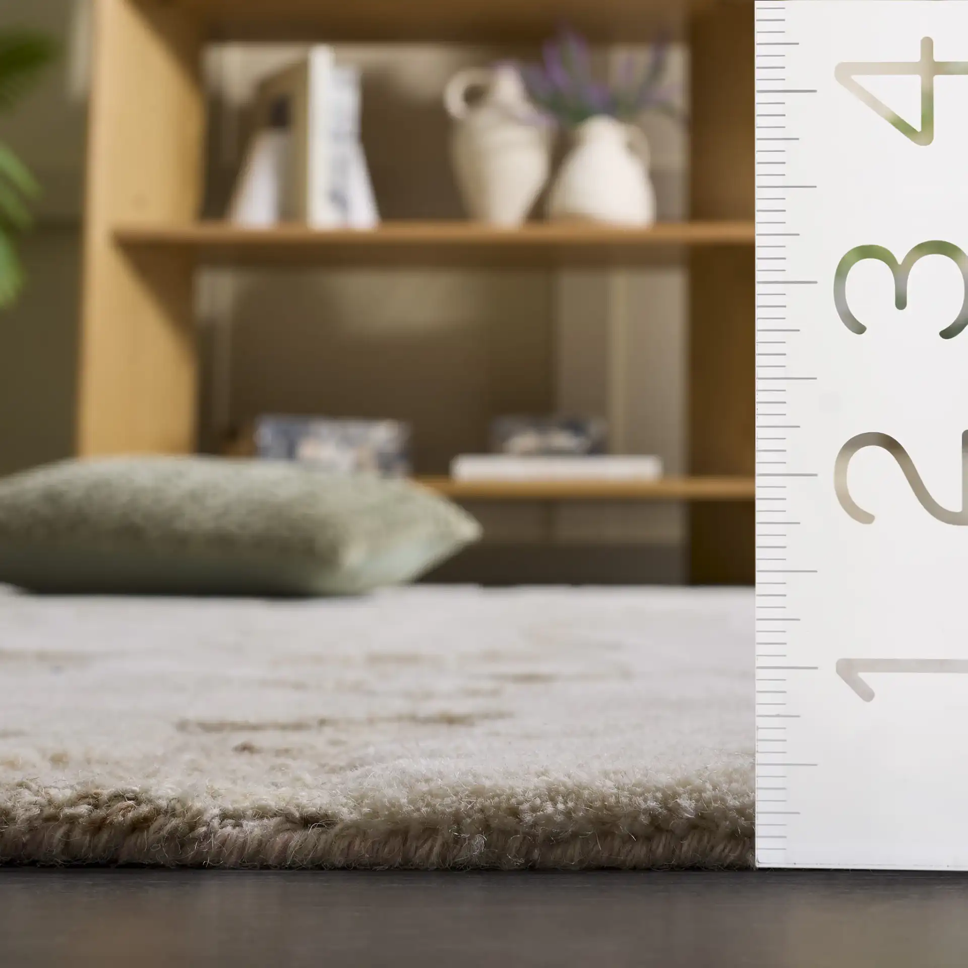 Harvest Abstract Pebble Hand-Tufted Wool Rug in Beige / Taupe in a styled room
