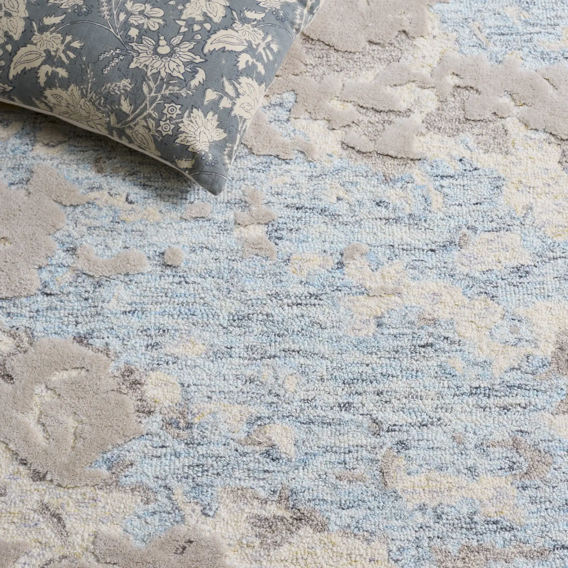 Harvest Abstract Textured Hand-Tufted Wool Rug in Taupe / Blue in a styled room