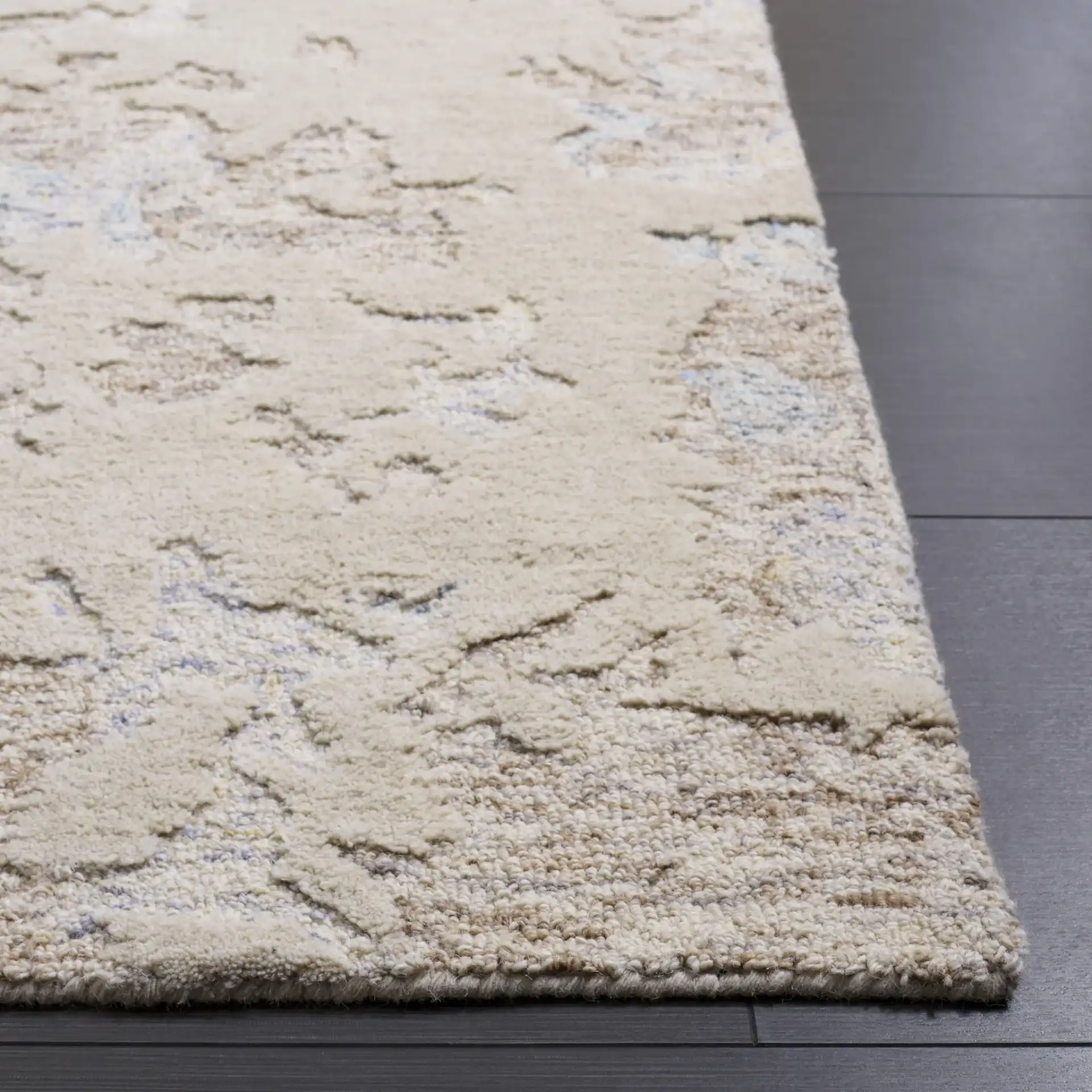 Harvest Abstract Mottled Hand-Tufted Wool Rug in Taupe / Blue in a styled room