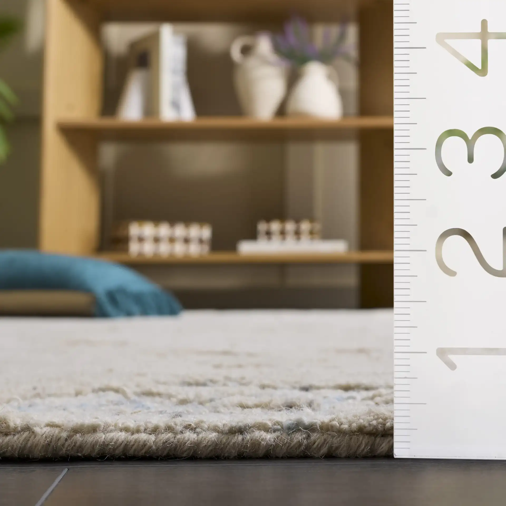 Harvest Abstract Mottled Hand-Tufted Wool Rug in Taupe / Blue in a styled room