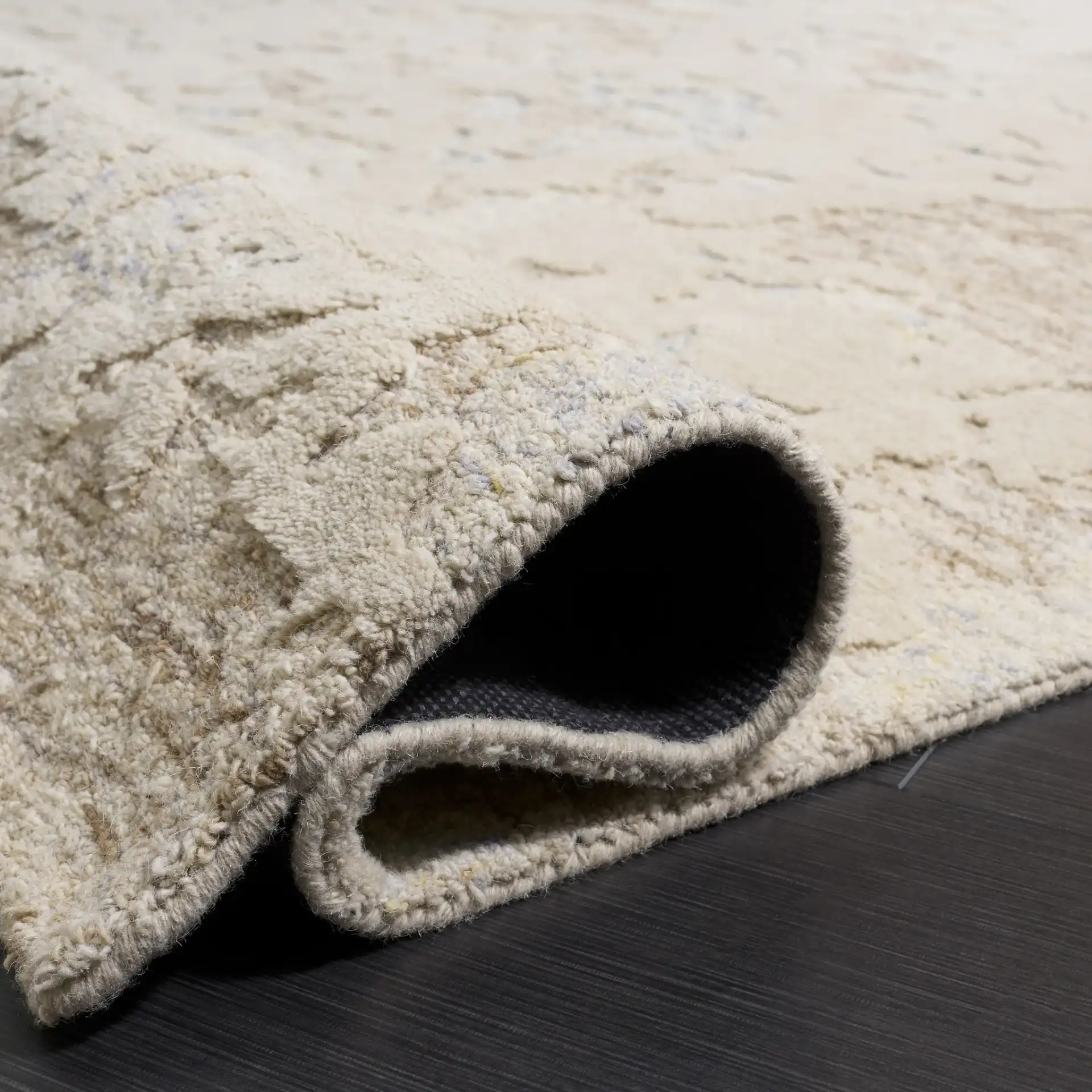 Harvest Abstract Mottled Hand-Tufted Wool Rug in Taupe / Blue in a styled room