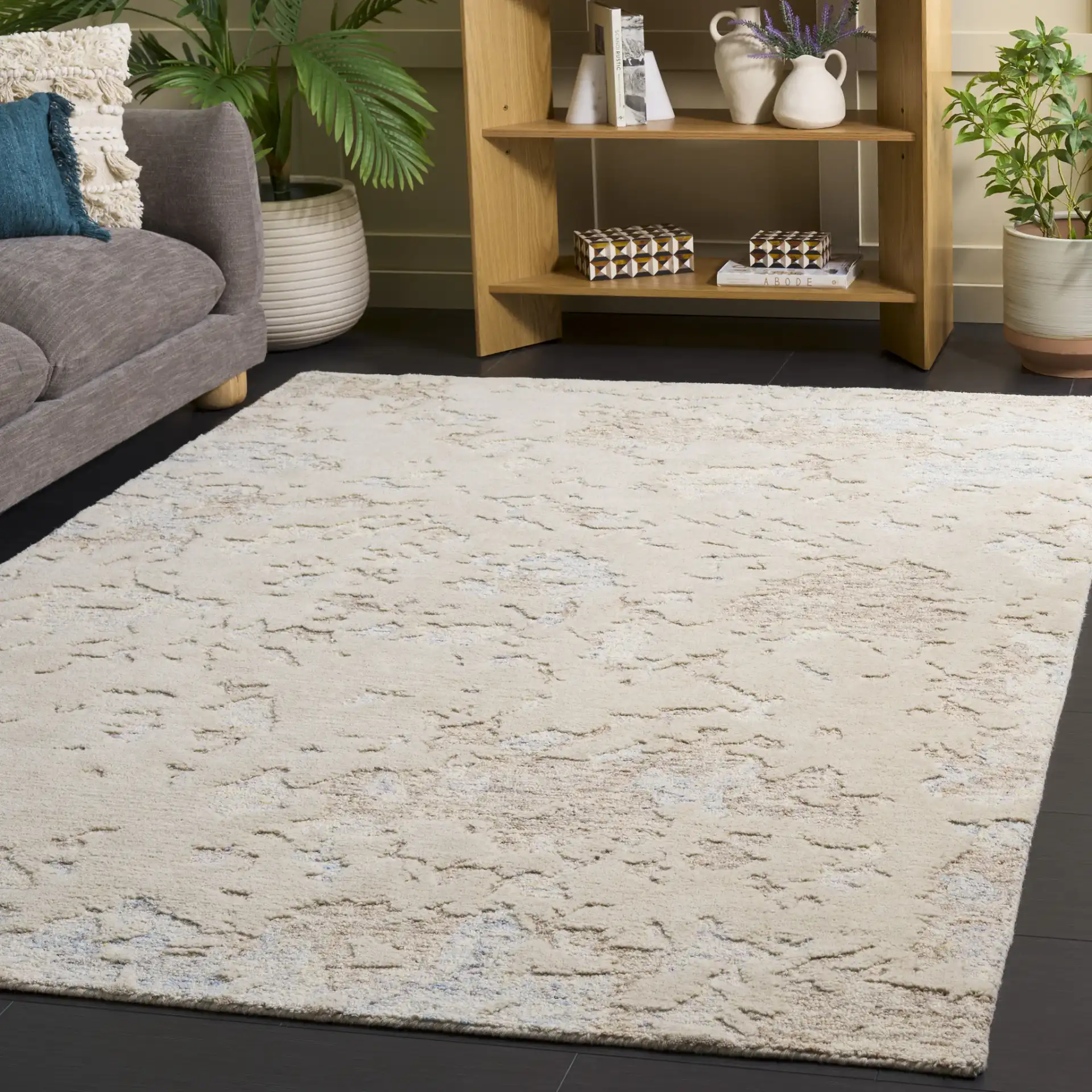 Harvest Abstract Mottled Hand-Tufted Wool Rug in Taupe / Blue in a styled room