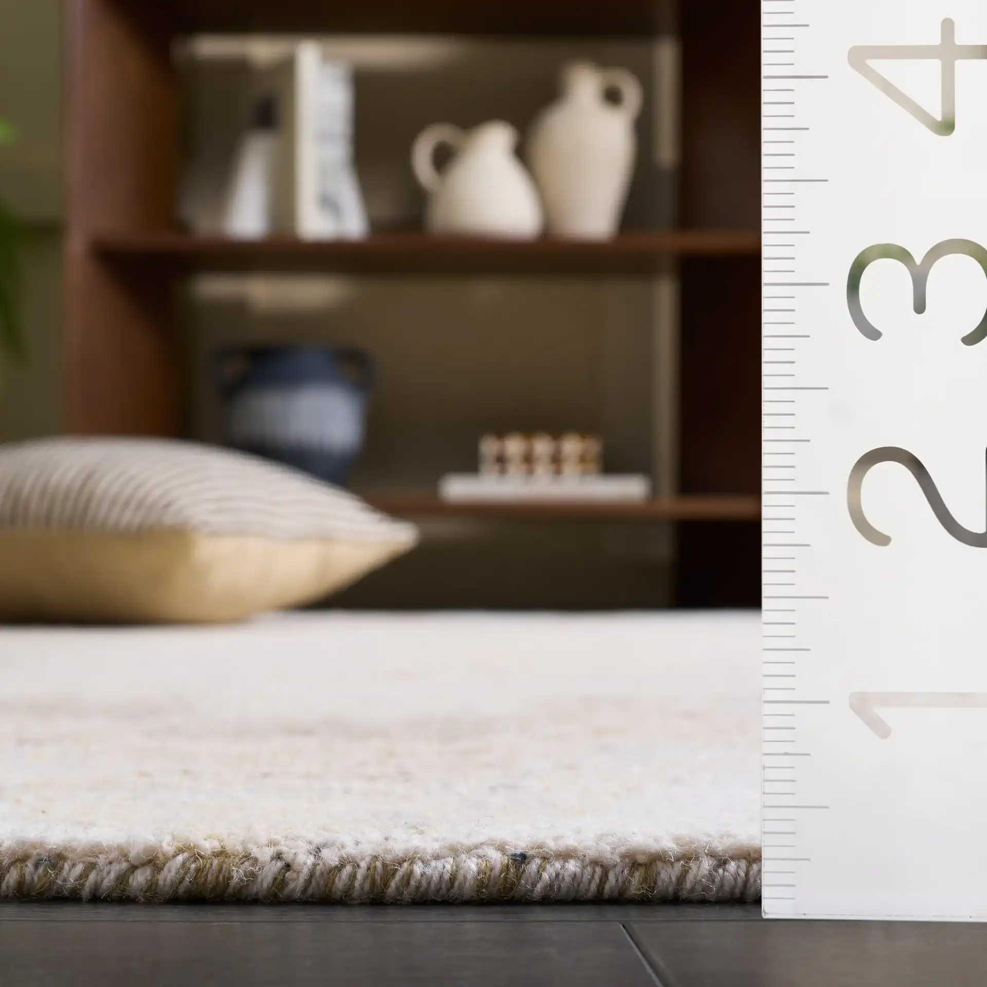 Harvest Scalloped Border Hand-Tufted Wool Rug in Beige / Brown in a styled room