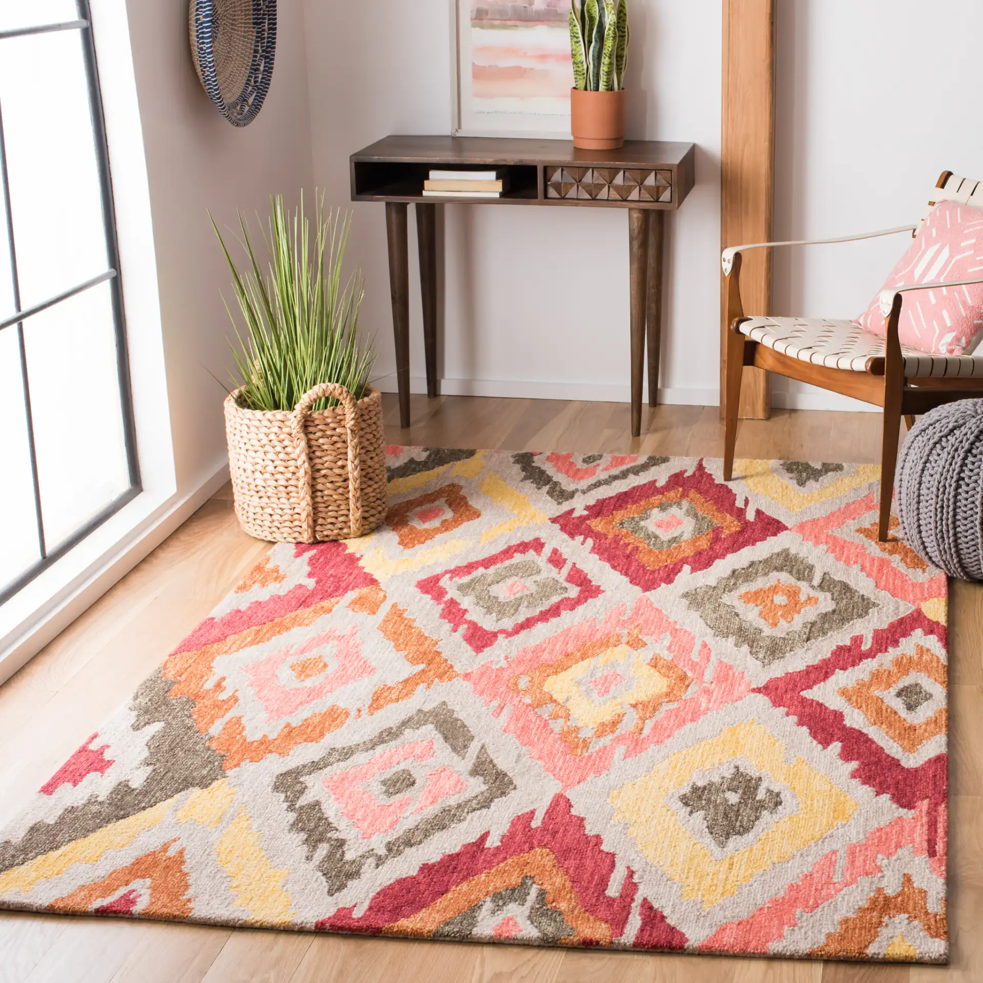 Ikat Diamond Hand-Tufted Wool Rug in Beige / Pink in a styled room
