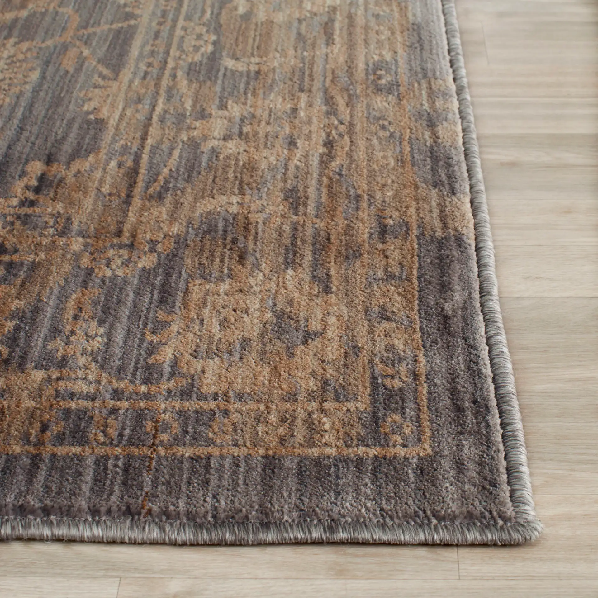 Infinity Bordered Floral Rug in Gray / Beige in a styled room