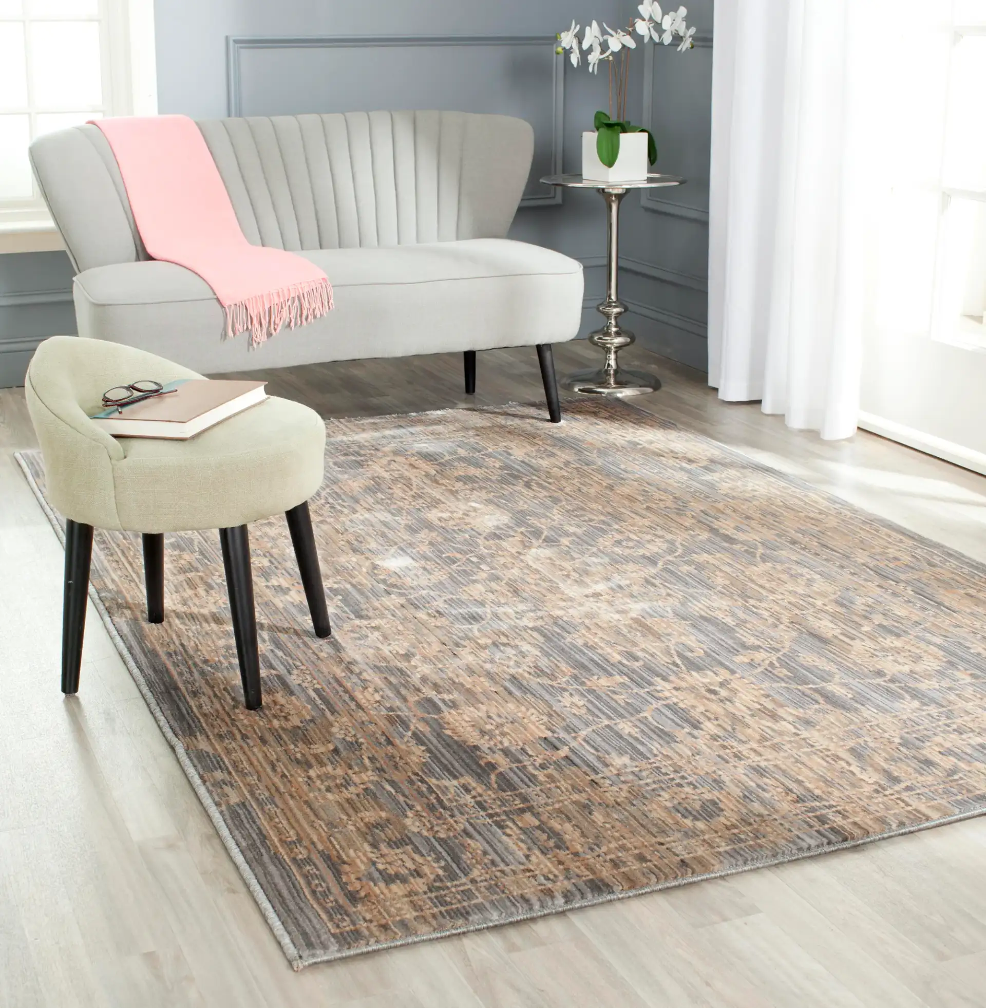 Infinity Bordered Floral Rug in Gray / Beige in a styled room