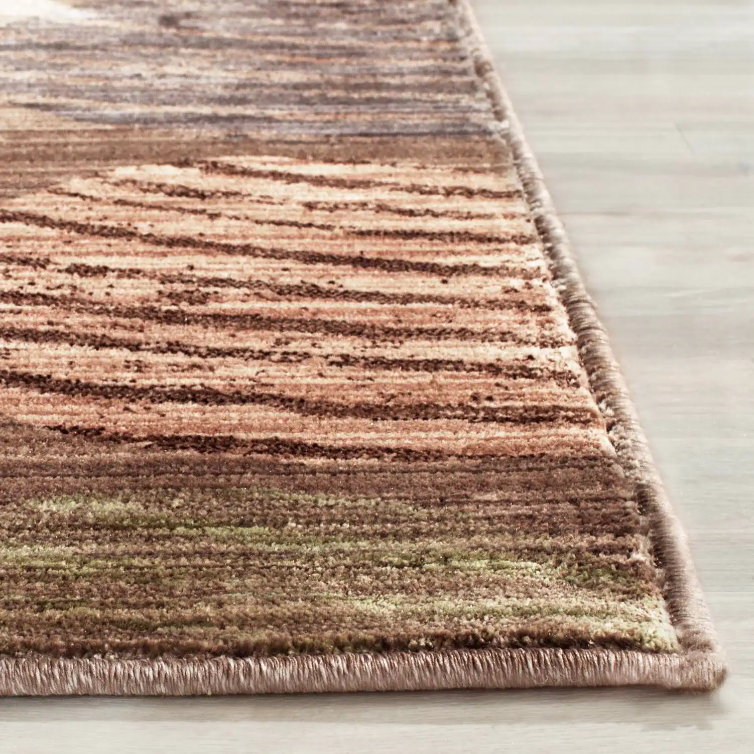 Infinity Pebble Rug in Taupe / Beige in a styled room