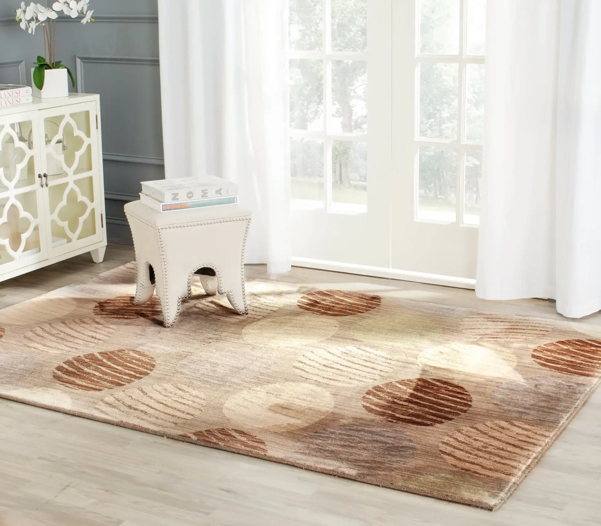 Infinity Pebble Rug in Taupe / Beige in a styled room