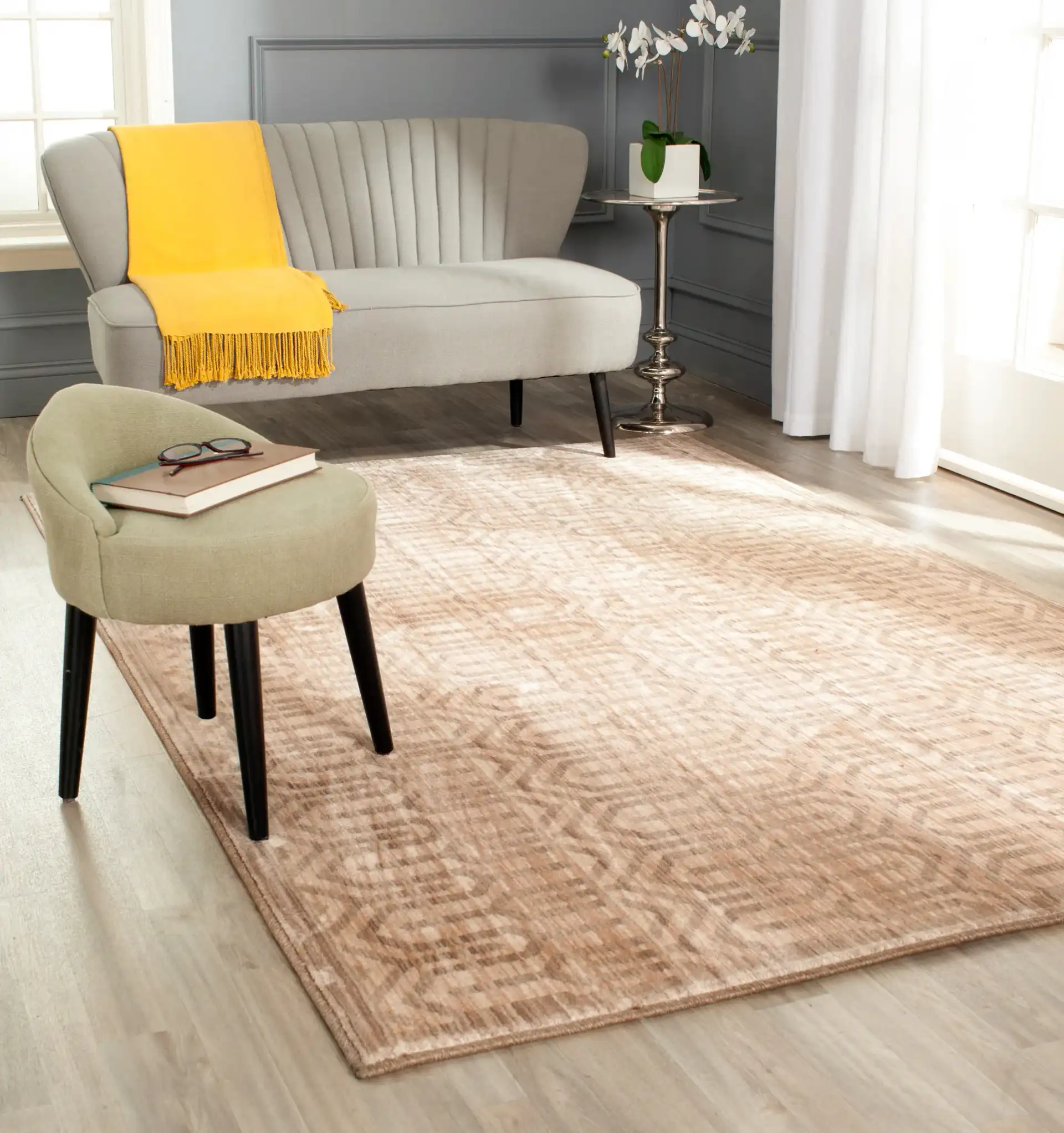 Infinity Chevron Stripe Rug in Beige / Taupe in a styled room