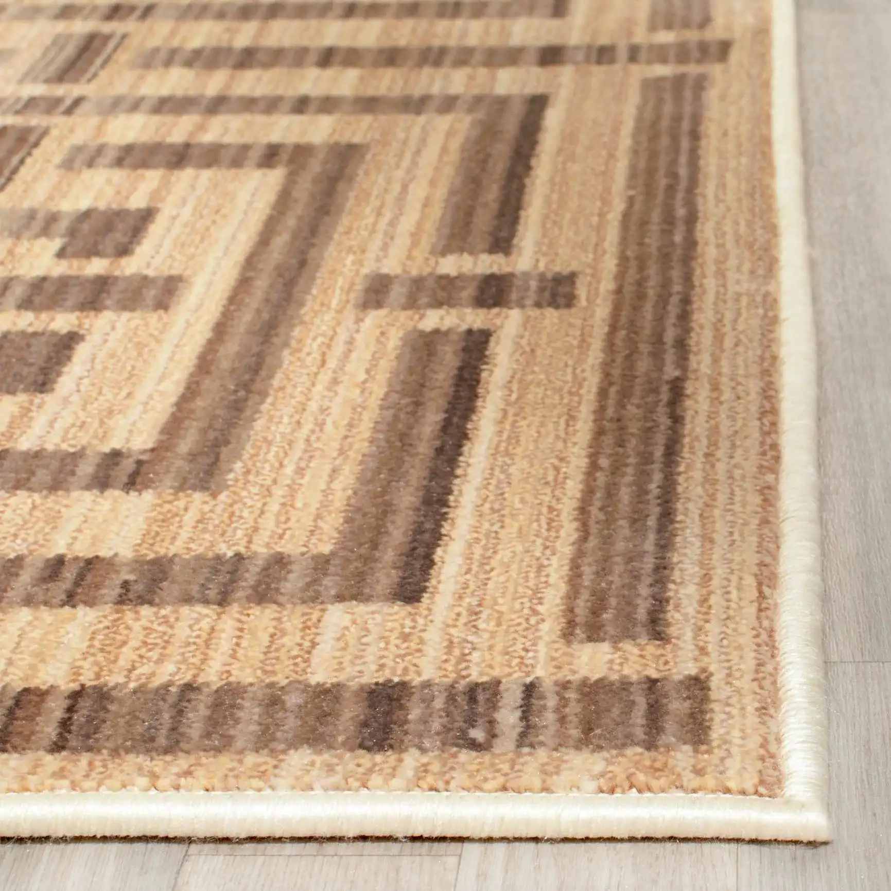 Infinity Maze Grid Rug in Yellow / Taupe in a styled room