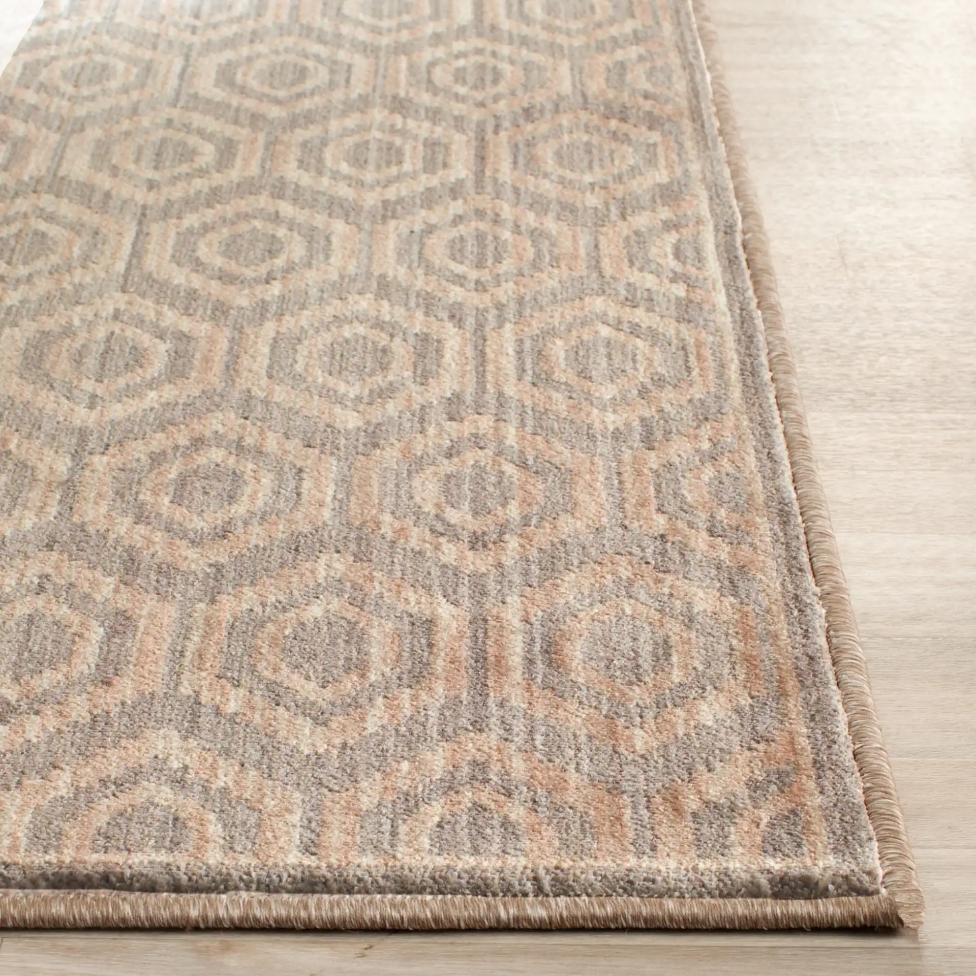 Infinity Concentric Hexagon Rug in Gray / Beige in a styled room