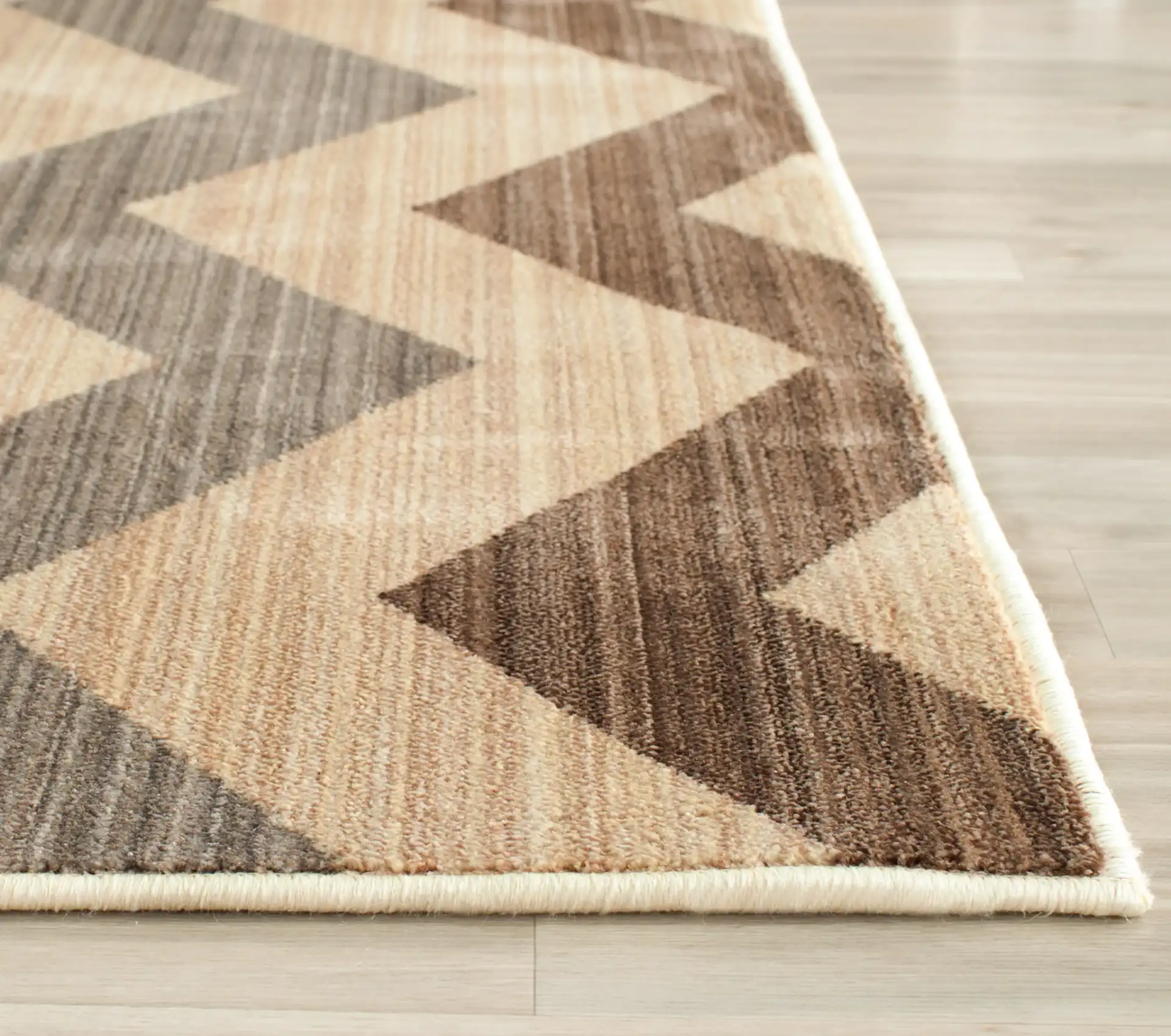 Infinity Zigzag Stripe Rug in Yellow / Brown in a styled room
