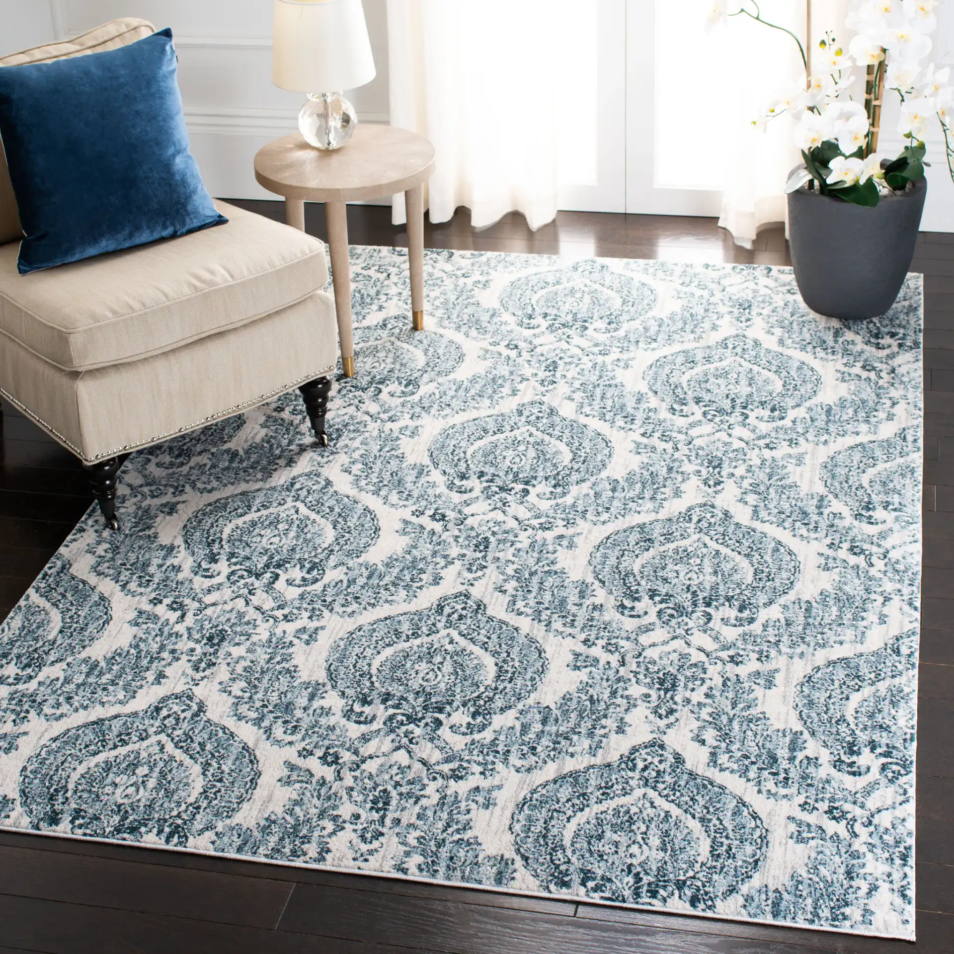 Isabella Damask Rug in Navy / Ivory in a styled room