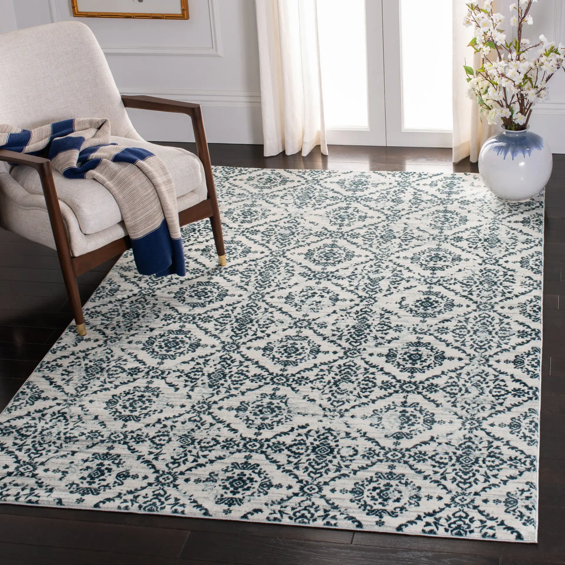 Isabella Floral Trellis Rug in Navy / Ivory in a styled room