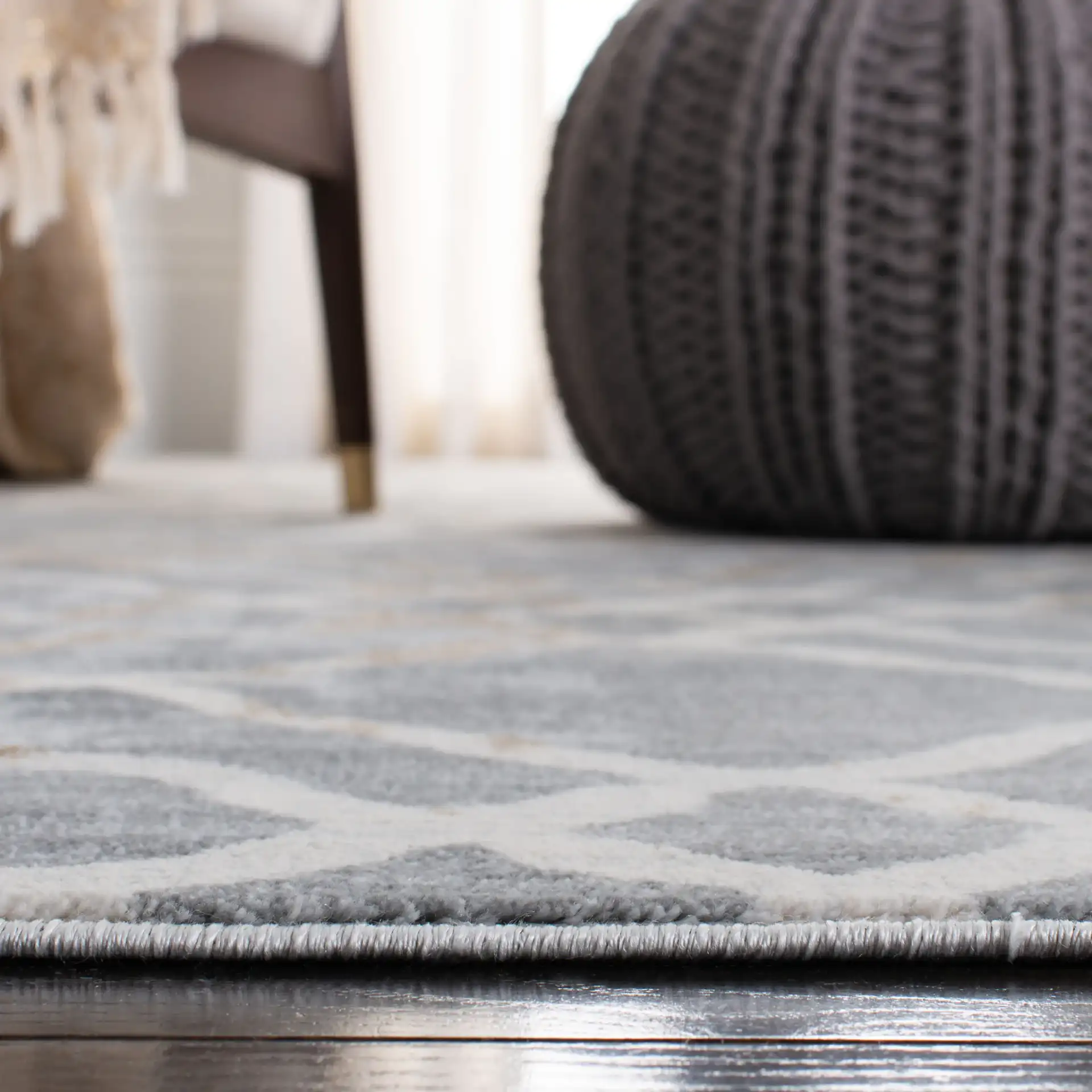 Isabella Distressed Trellis Rug in Silver / Ivory in a styled room