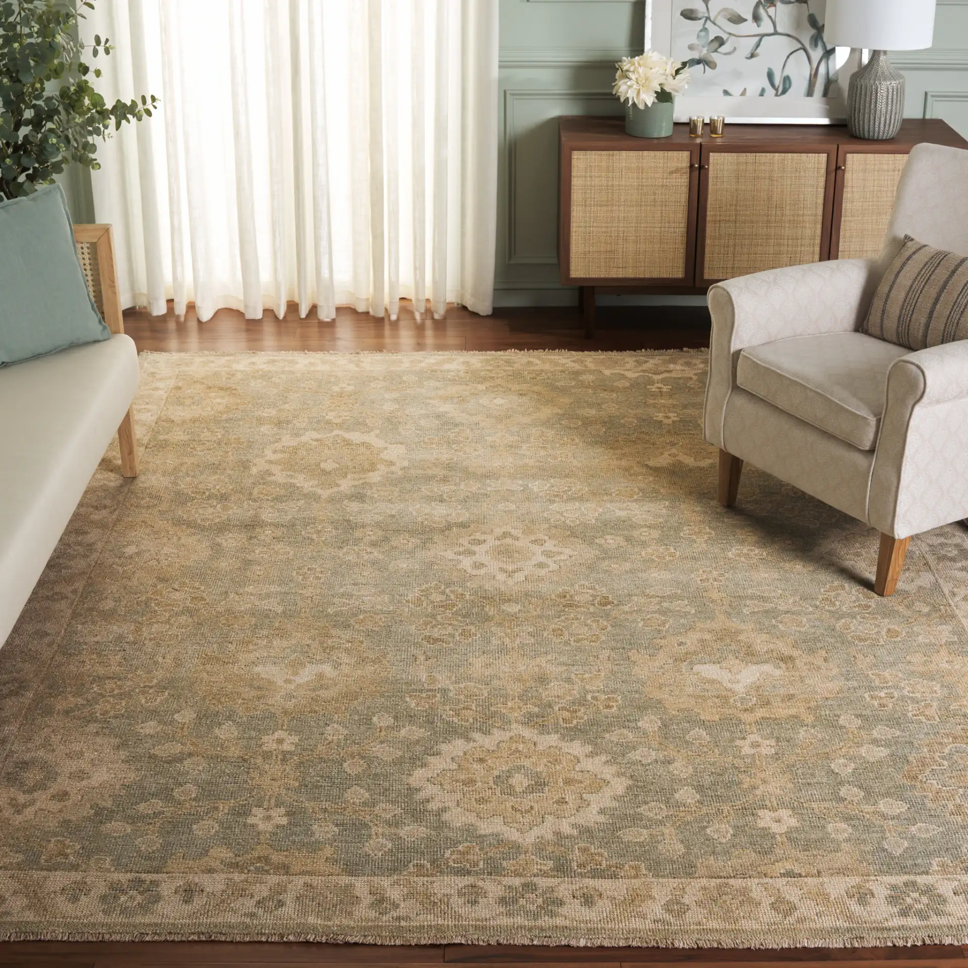 Izmir Floral Medallion Hand-Knotted Rug in Light Blue / Ivory in a styled room