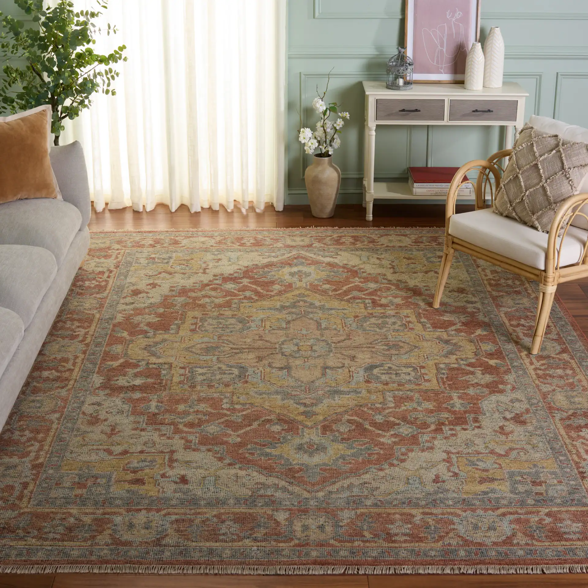 Izmir Stepped Medallion Hand-Knotted Wool Rug in Rust / Gray in a styled room