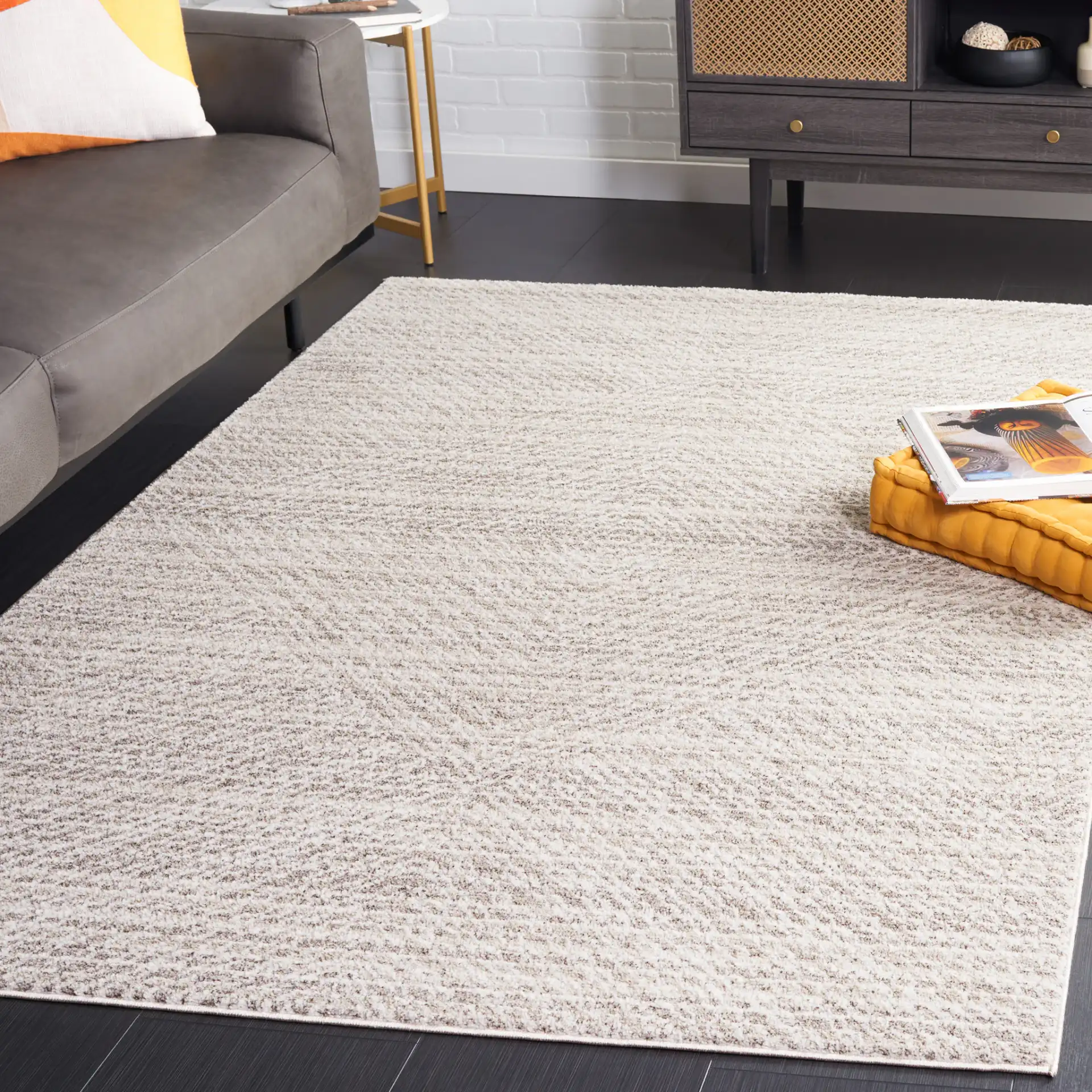 Jade Concentric Diamond Rug in Beige / Ivory in a styled room