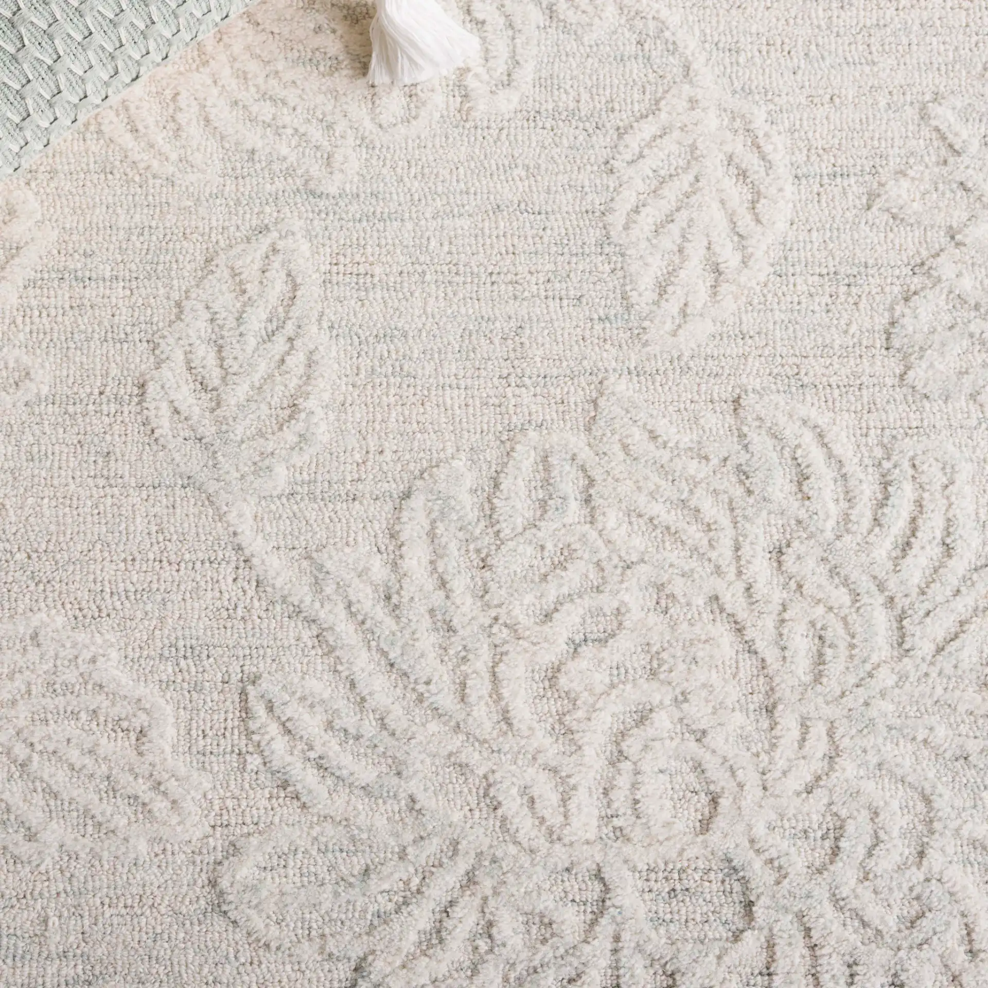 Jardin Chrysanthemum Floral Hand-Tufted Wool Rug in Light Teal / Ivory in a styled room