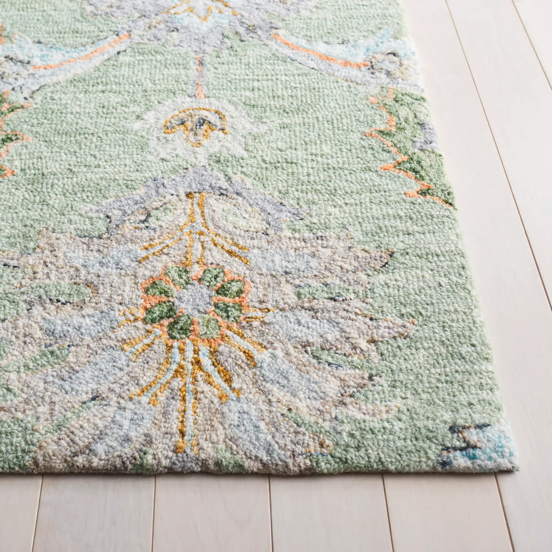 Jardin Allover Botanical Hand-Tufted Wool Rug in Sage / Green in a styled room
