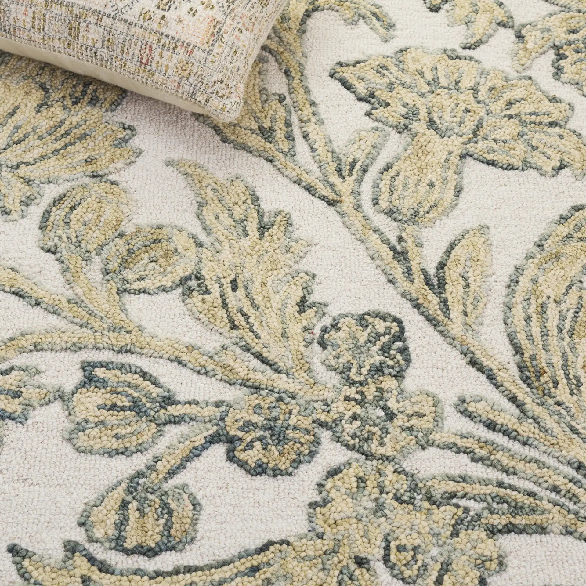 Jardin Jacobean Carnation Floral Hand-Tufted Wool Rug in Ivory / Green in a styled room