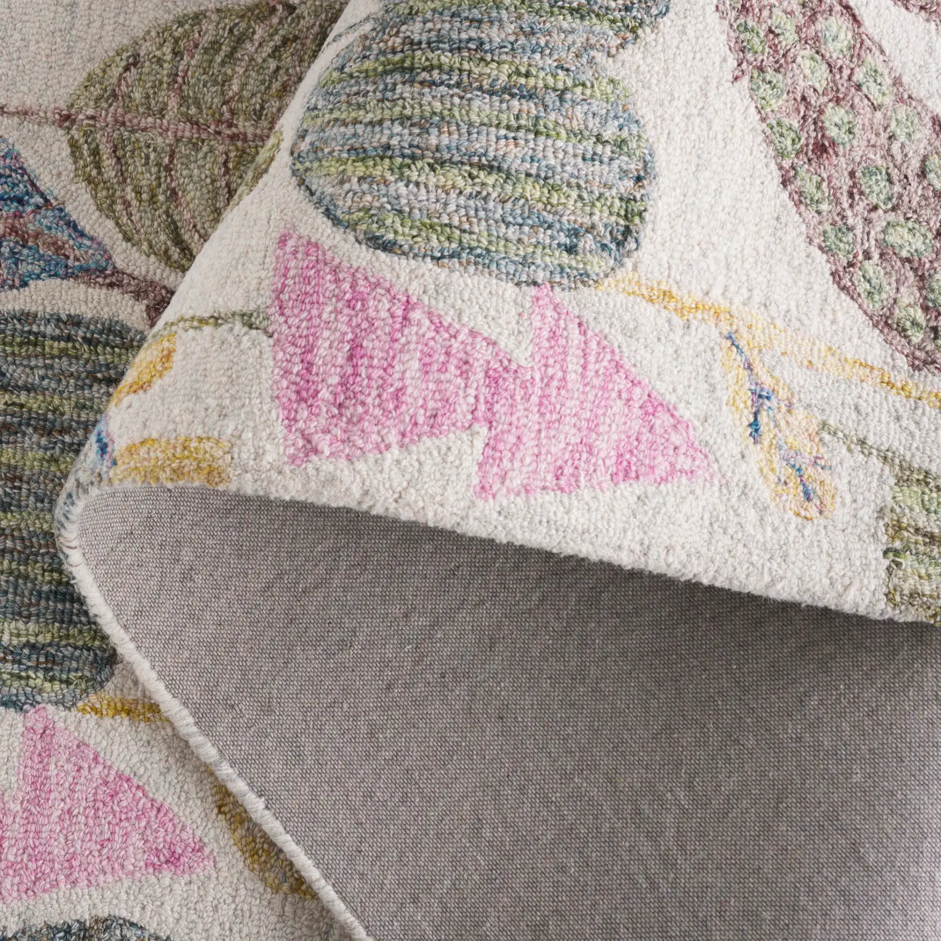 Jardin Garden Botanical Hand-Tufted Wool Rug in Beige / Blue in a styled room