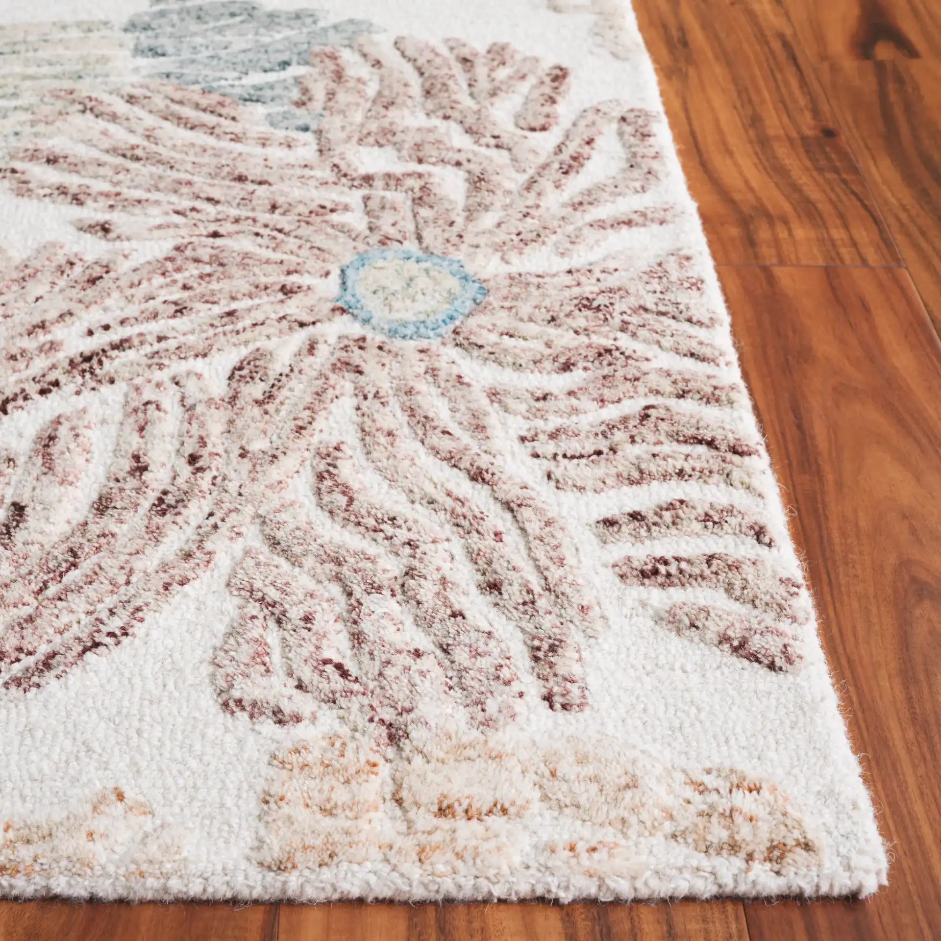 Jardin Daisy Floral Hand-Tufted Wool Rug in Red / Blue in a styled room