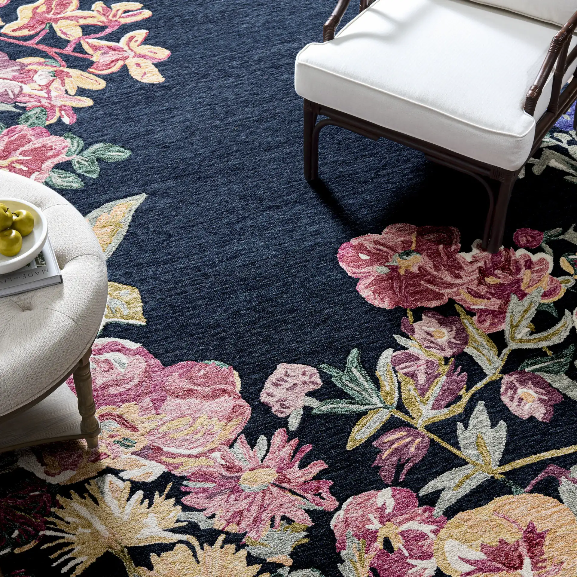 Jardin Asymmetrical Floral Hand-Tufted Wool Rug in Navy / Pink in a styled room