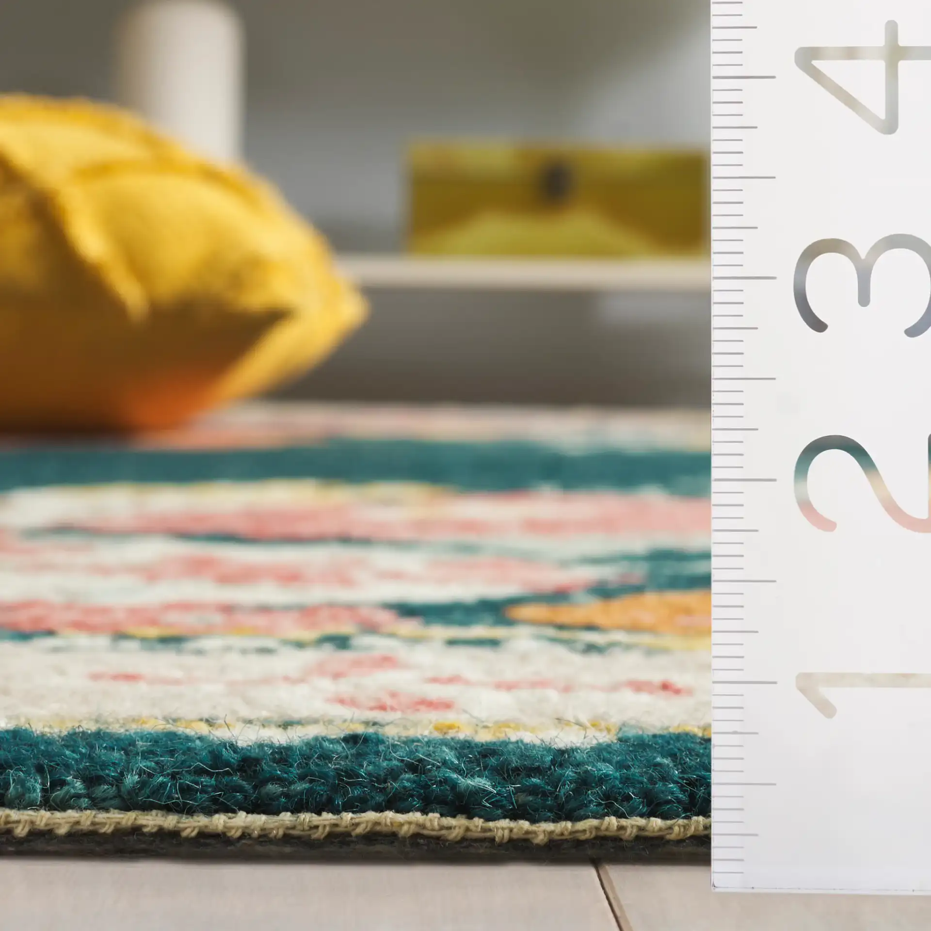Jardin Floral Border Hand-Tufted Wool Rug in Dark Green / Pink in a styled room
