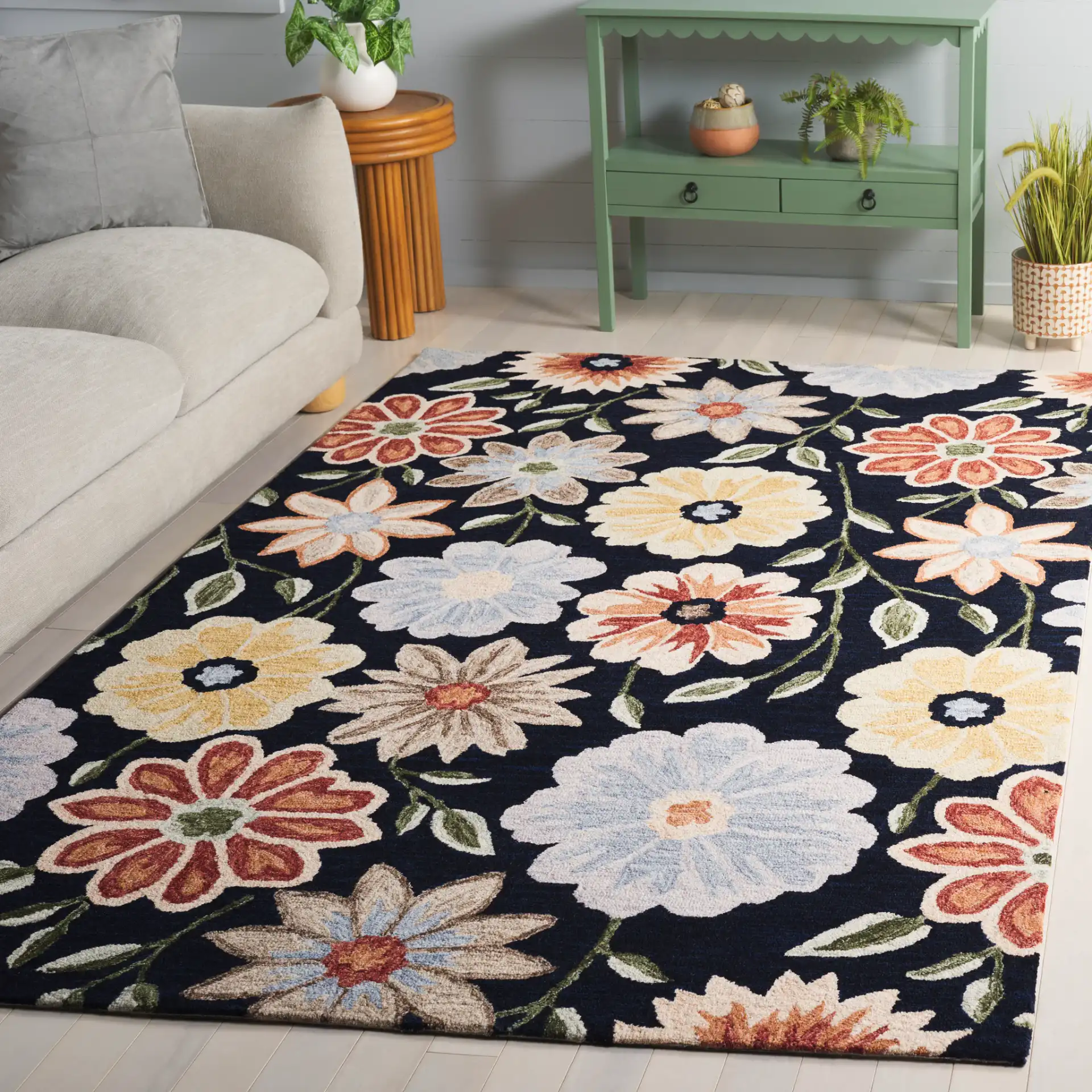Jardin Daisy Field Hand-Tufted Wool Rug in Black / Green in a styled room