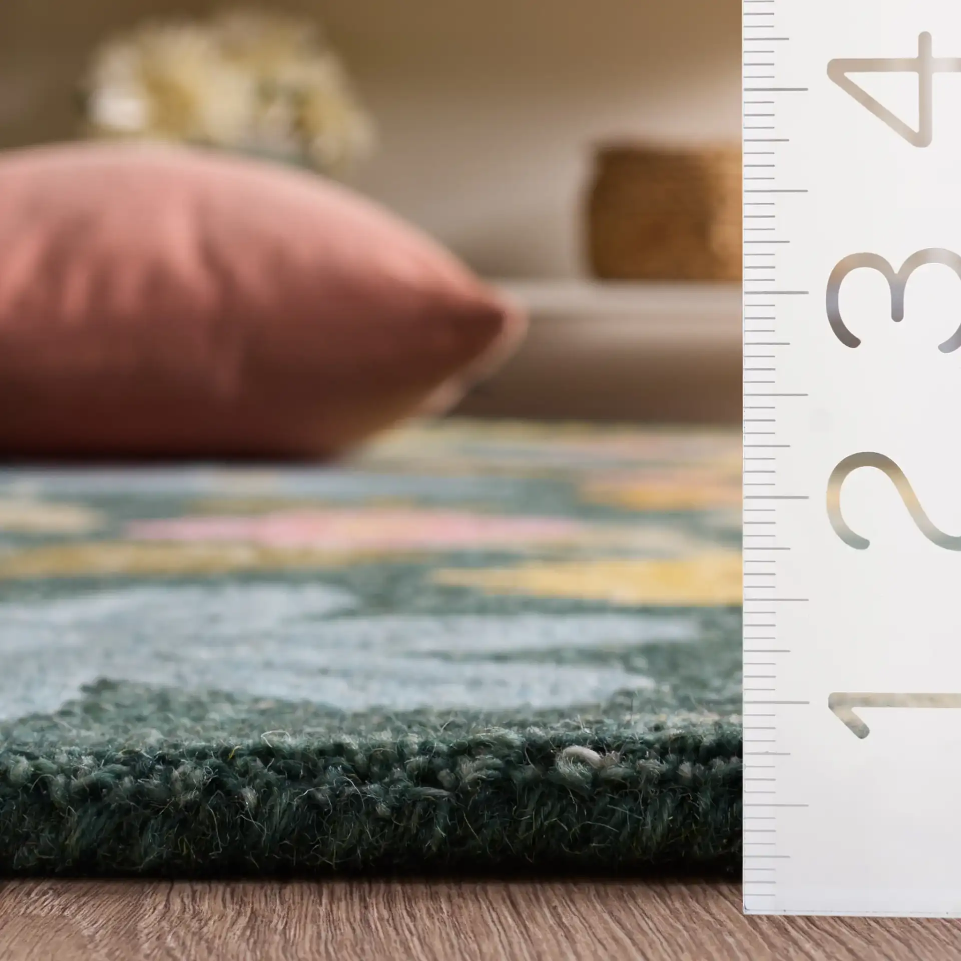 Jardin Folk Floral Hand-Tufted Wool Rug in Green / Blue in a styled room