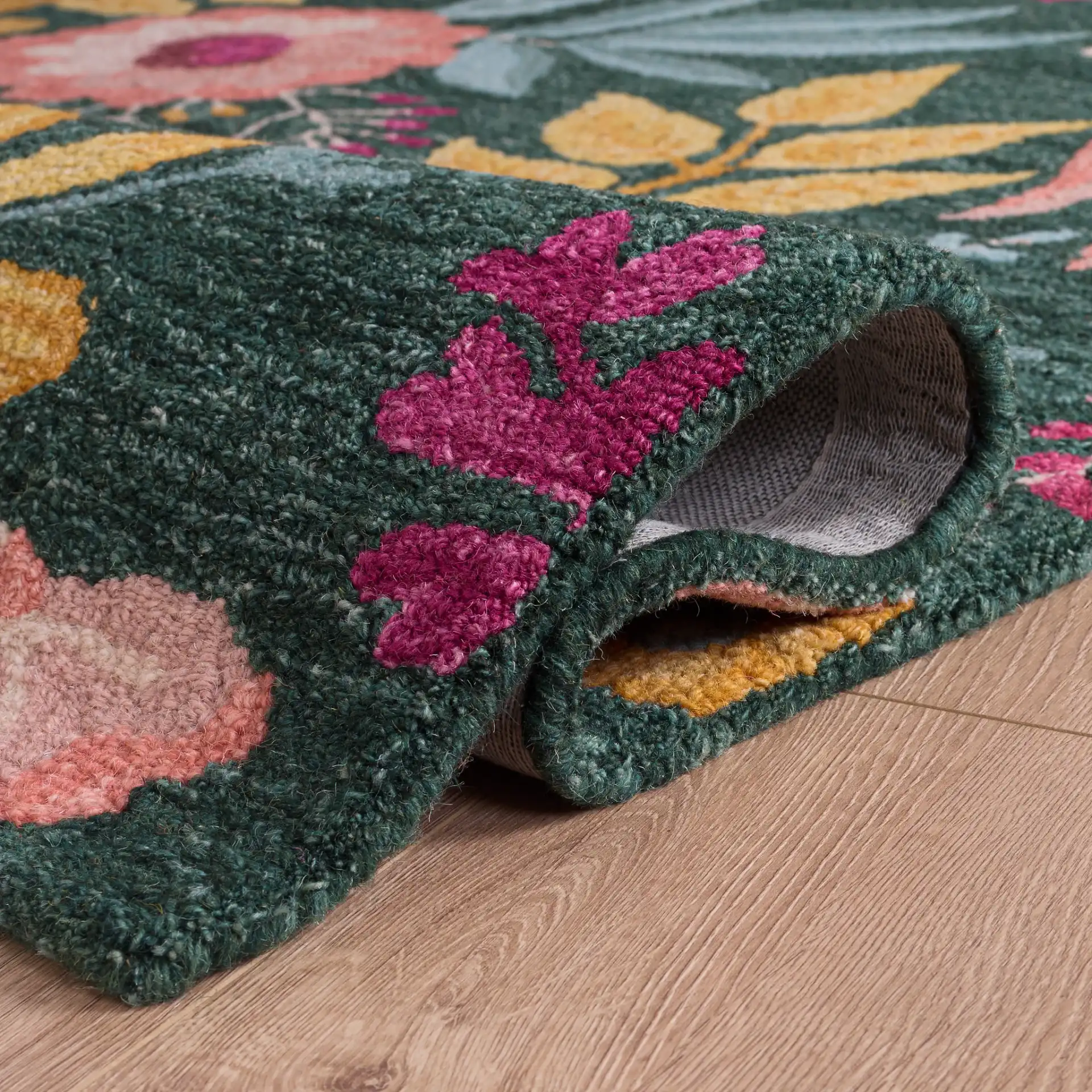Jardin Botanical Floral Hand-Tufted Wool Rug in Green / Yellow in a styled room