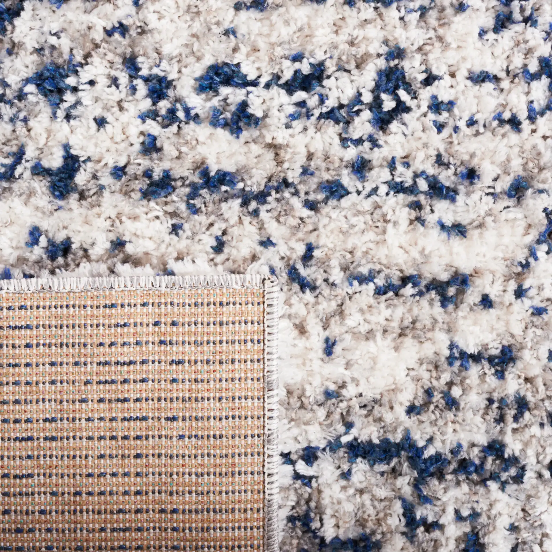 Jericho Striped Shag Rug in Navy / Ivory in a styled room