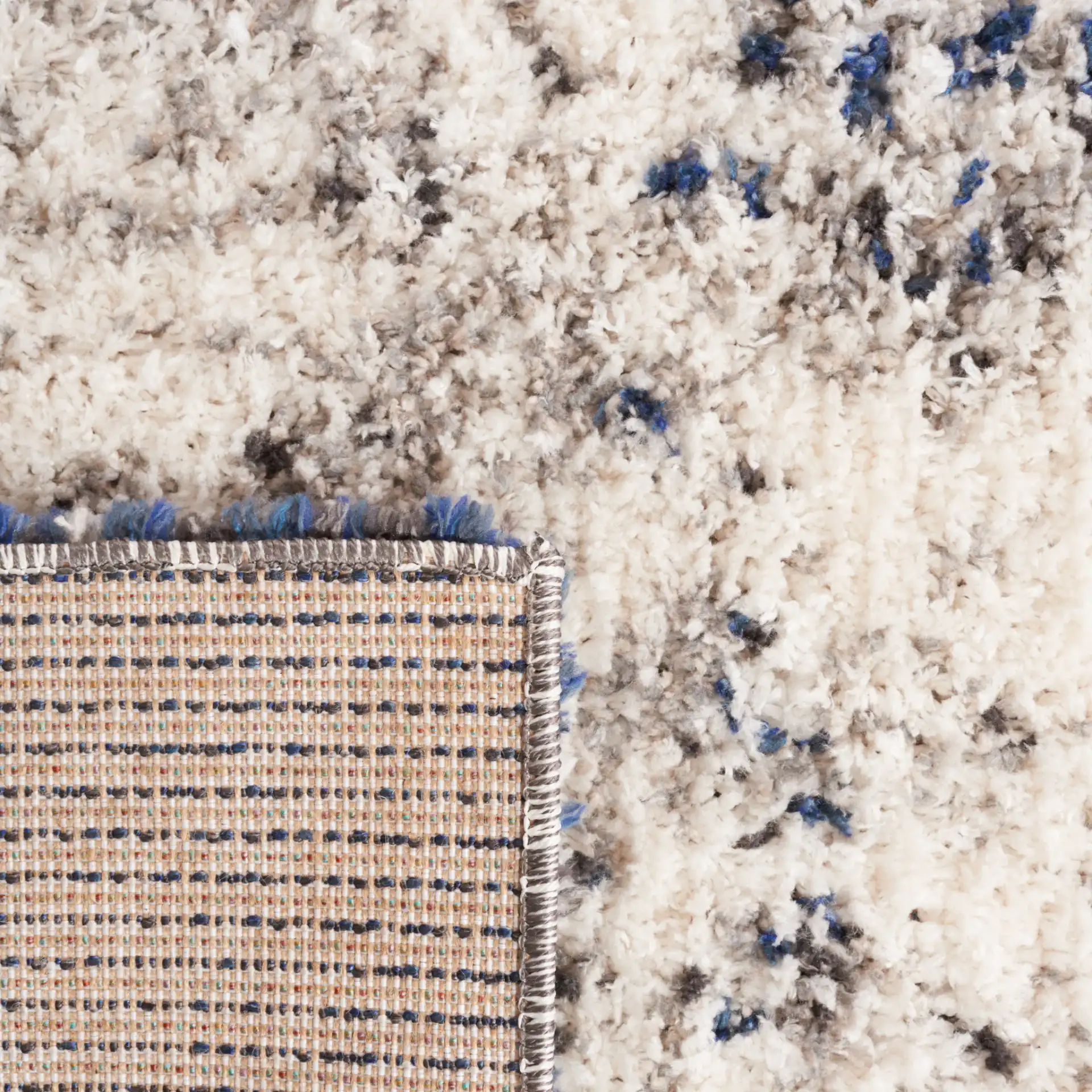 Jericho Abstract Shag Rug in Ivory / Navy in a styled room