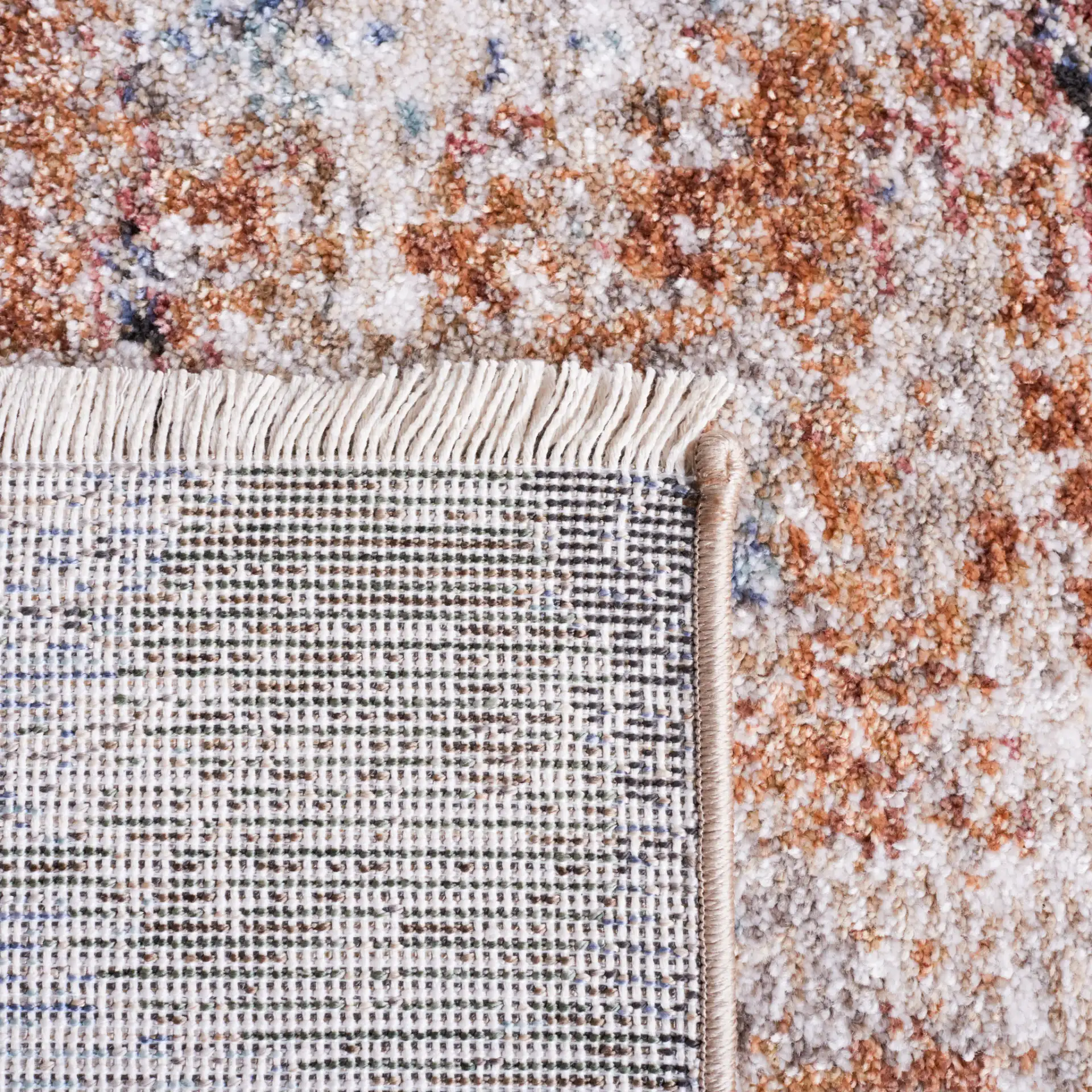 Jasmine Distressed Abstract Rug in Ivory / Blue in a styled room