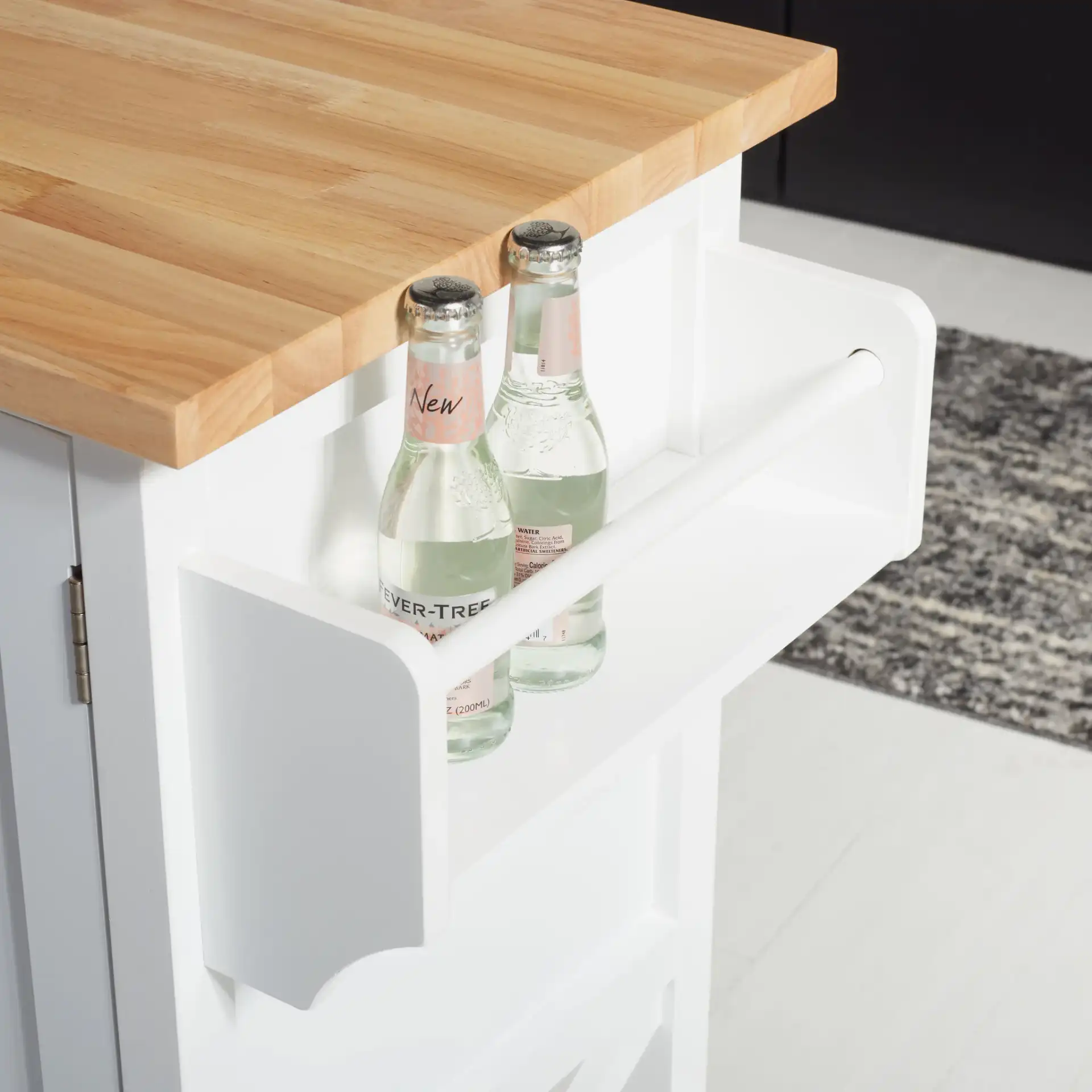 Kesler Two-Door One-Shelf Cart in White / Natural in a styled room